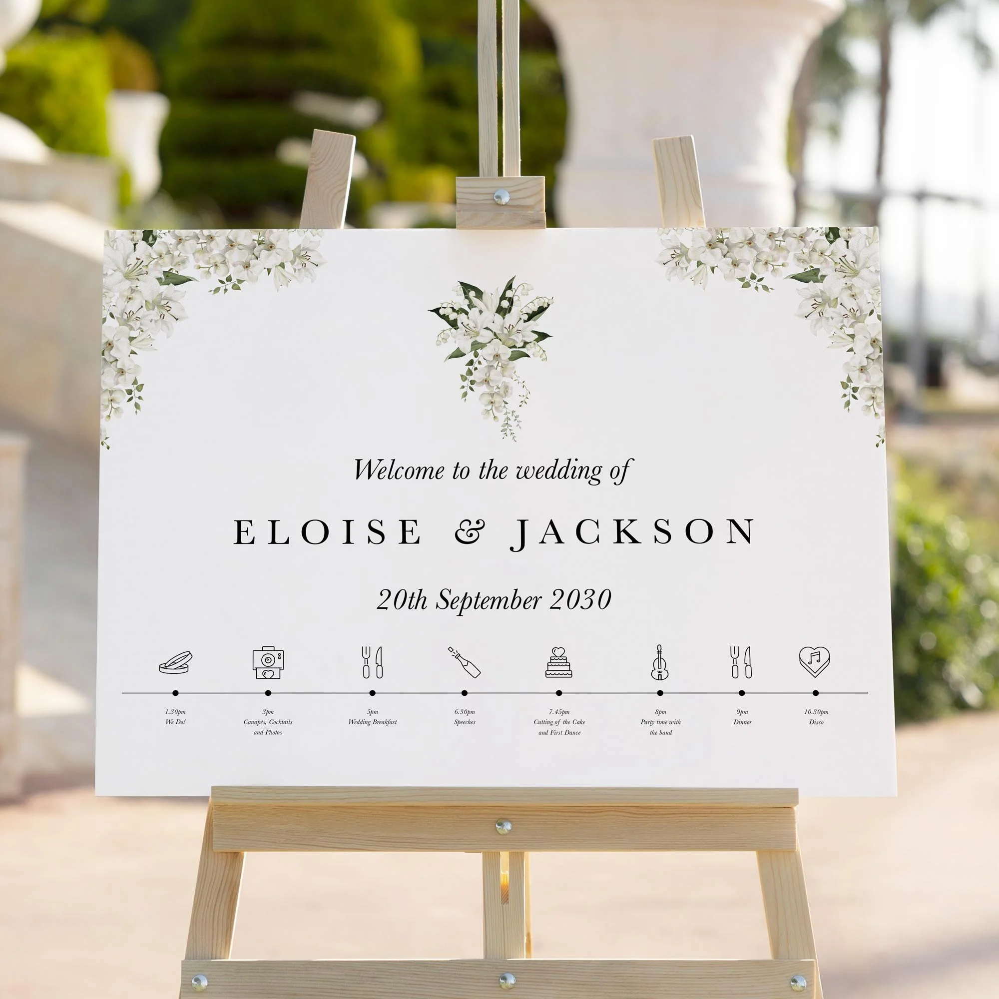 White Lily wedding welcome sign styled outdoors close-up
