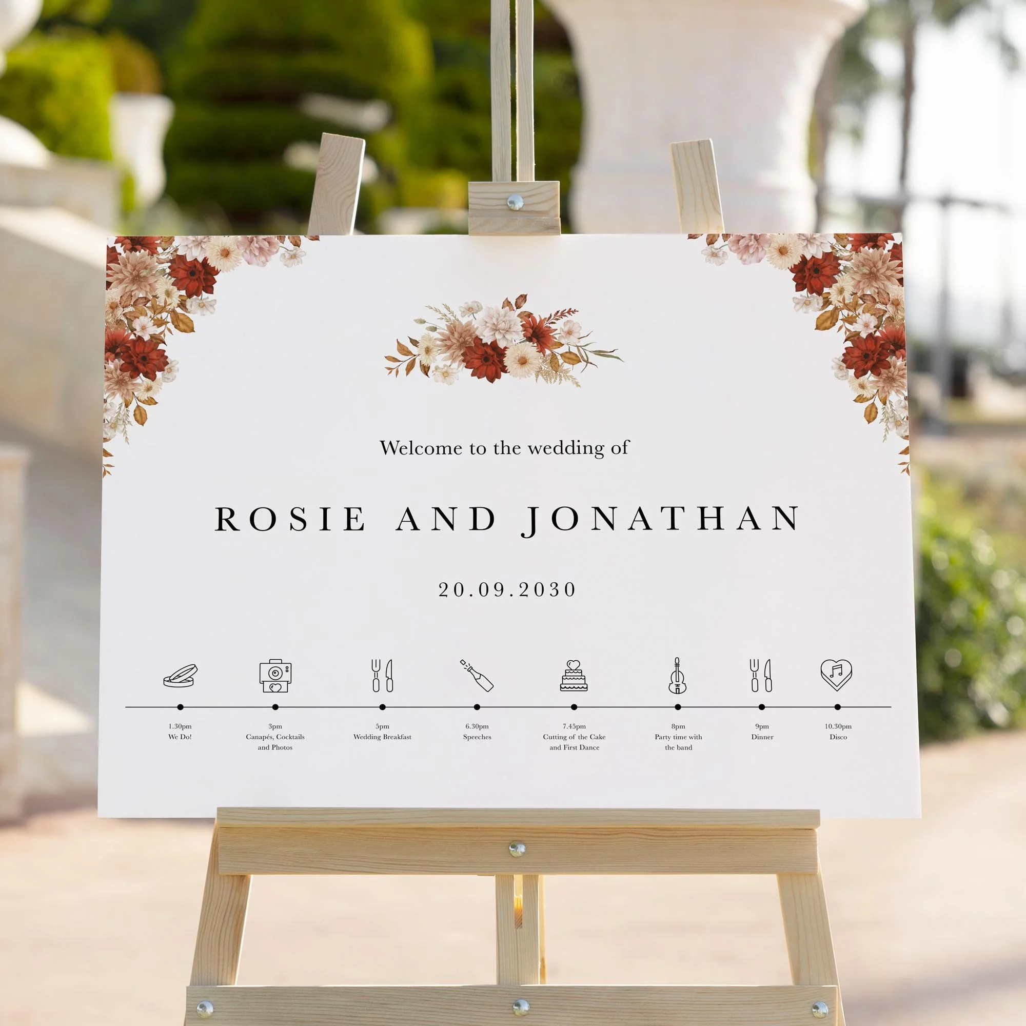 Rustic Orange Floral wedding welcome sign styled outdoors close-up