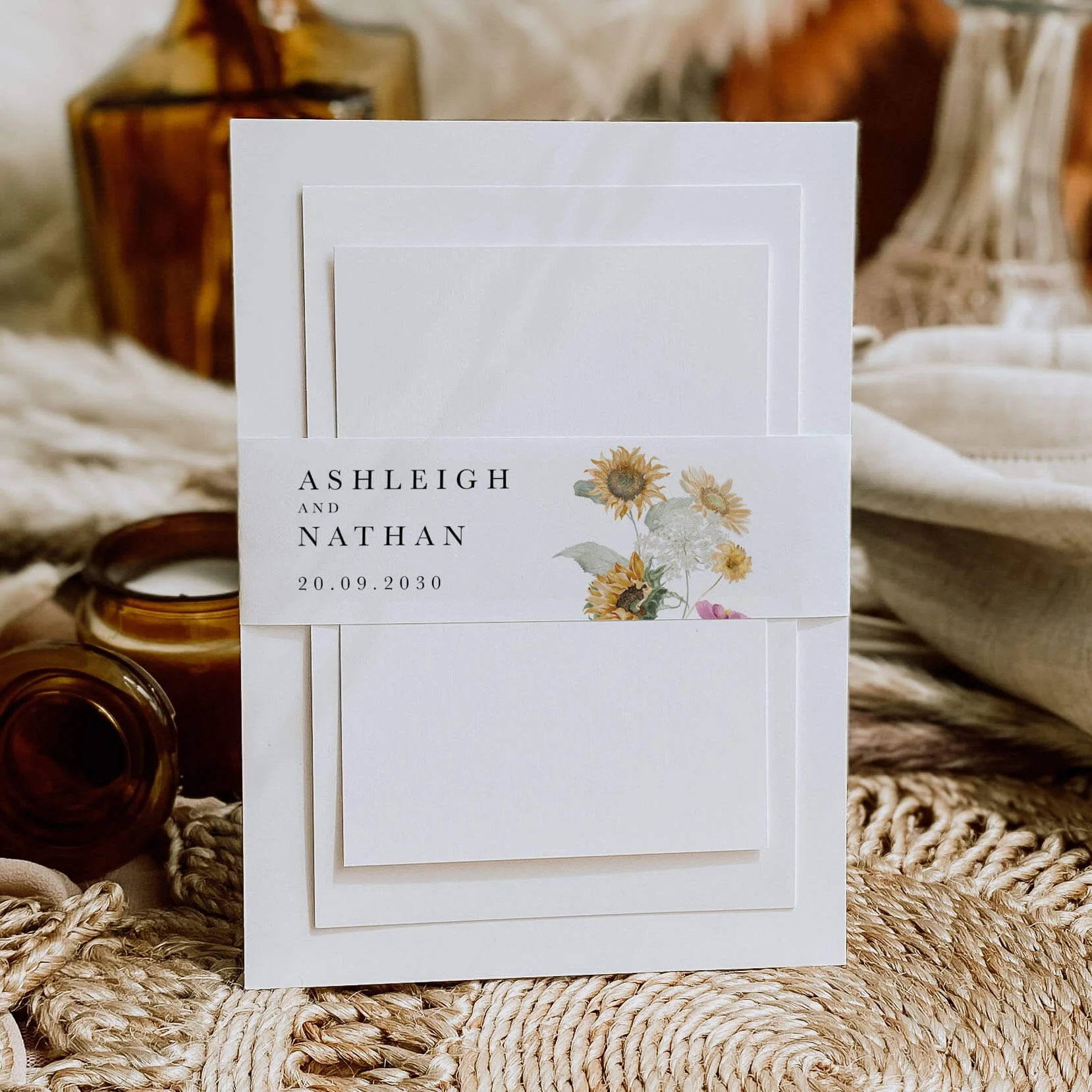 Autumn Sunflower personalised wedding belly bands with watercolour yellow sunflower illustration wrapped around wedding invitations