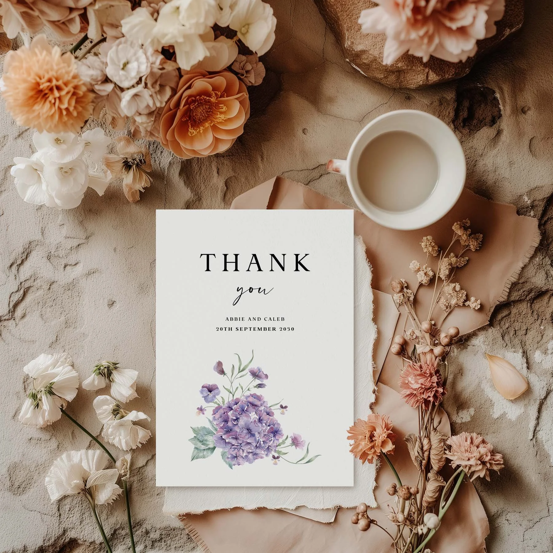Purple Hydrangea wedding thank you card styled with flowers and stationery details