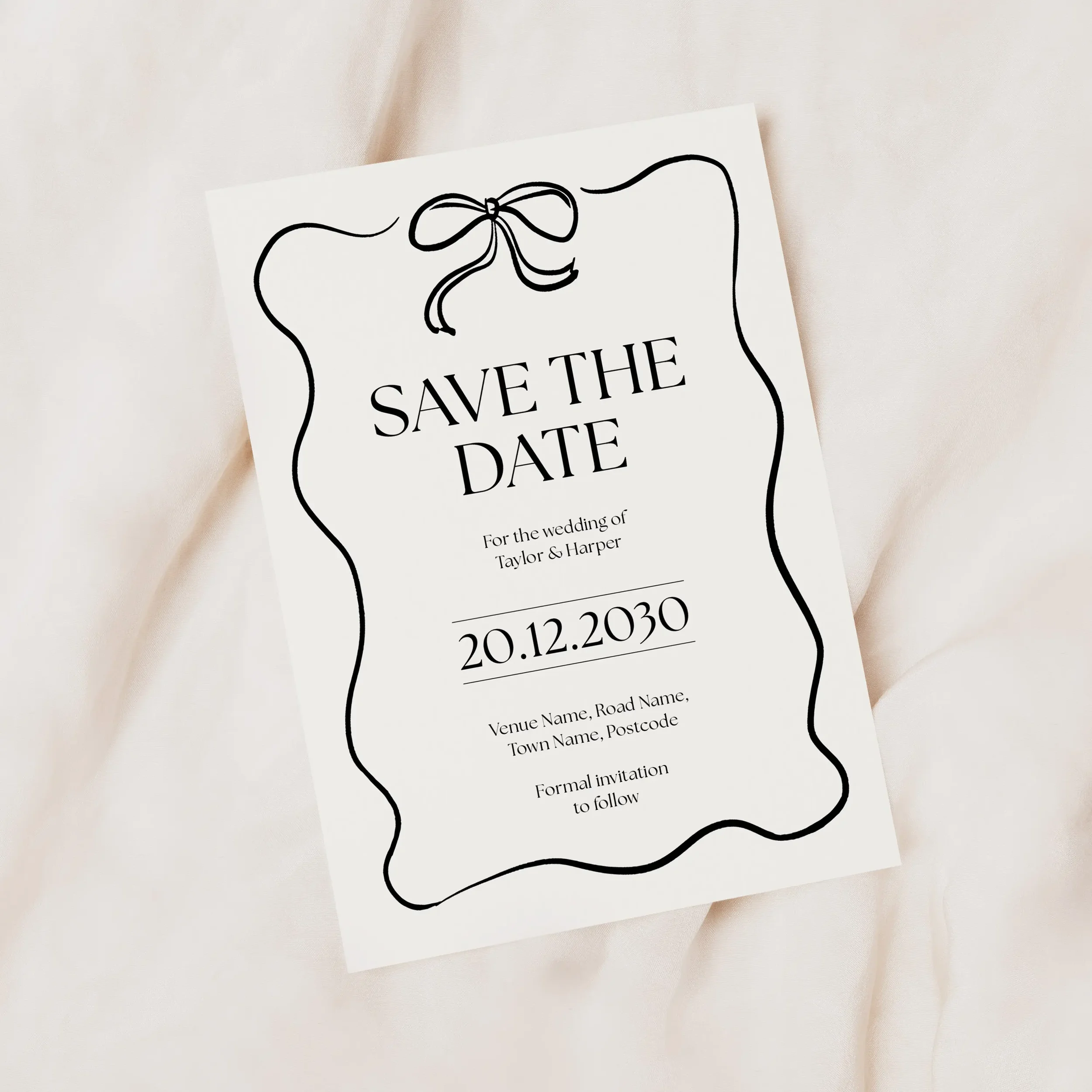 Black Tie Save the Date card in monochrome with elegant black bow.