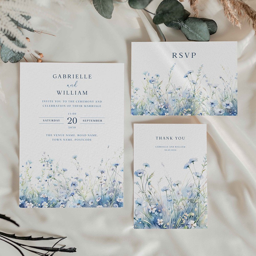 Wedding stationery suite featuring blue wildflowers.