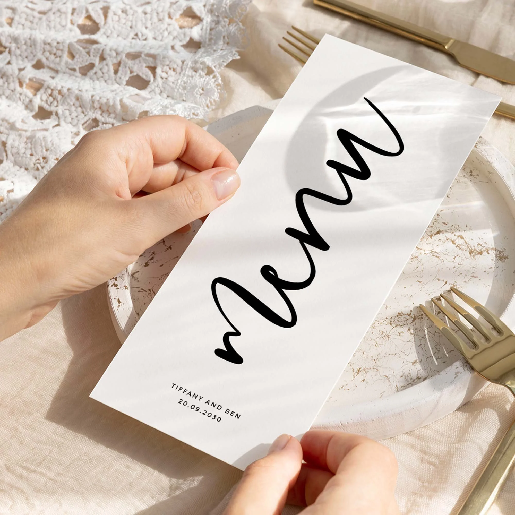 Hand holding Modern Script Font wedding menu card showing size and printed design details
