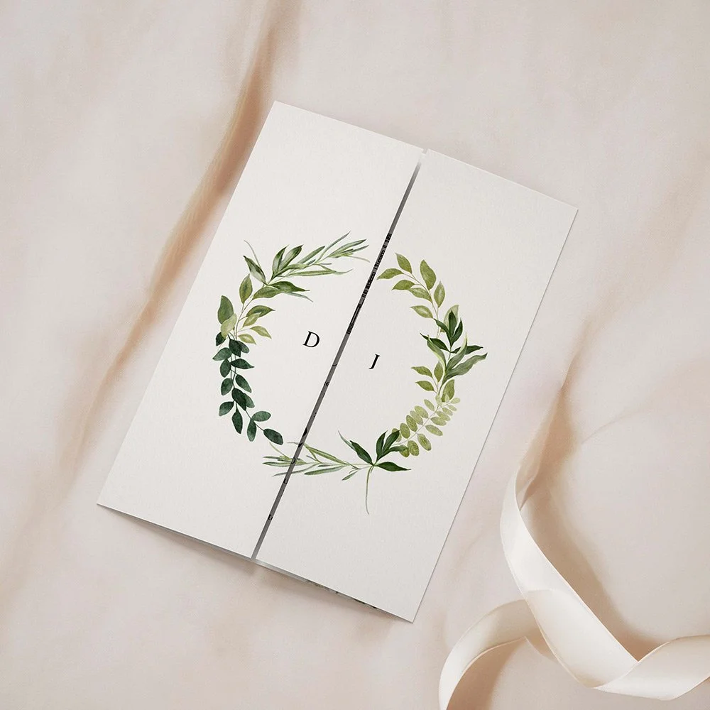 Gatefold wedding invitation with greenery detail