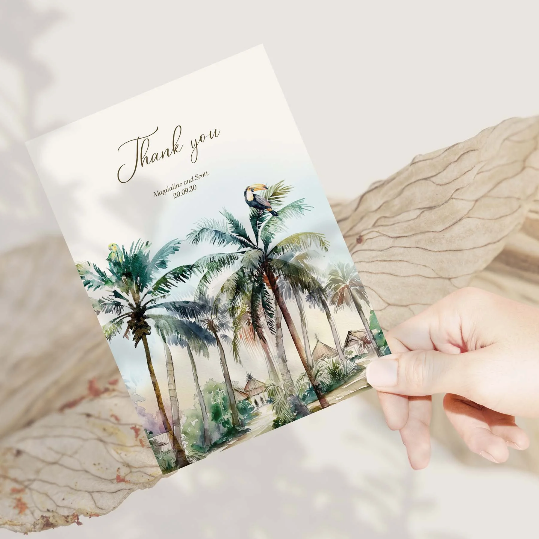 Hand holding a Tropical Beach wedding thank you card
