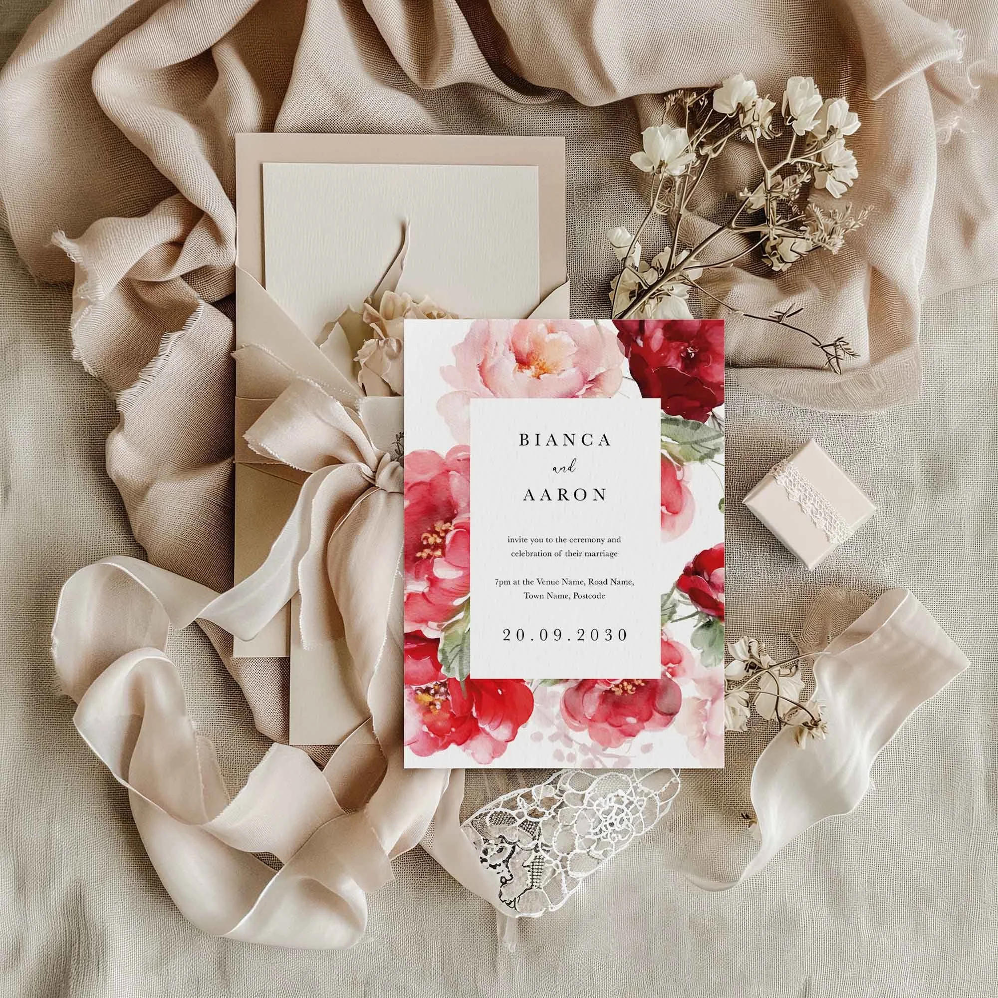 Red Floral Frame wedding invitation styled in a flat lay environment with wedding props