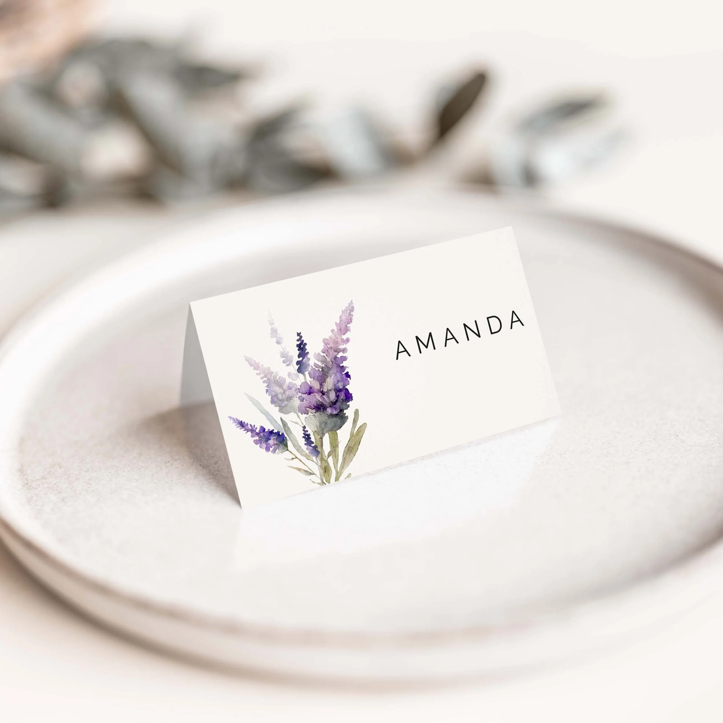 Lavender wedding place card with purple floral sprig