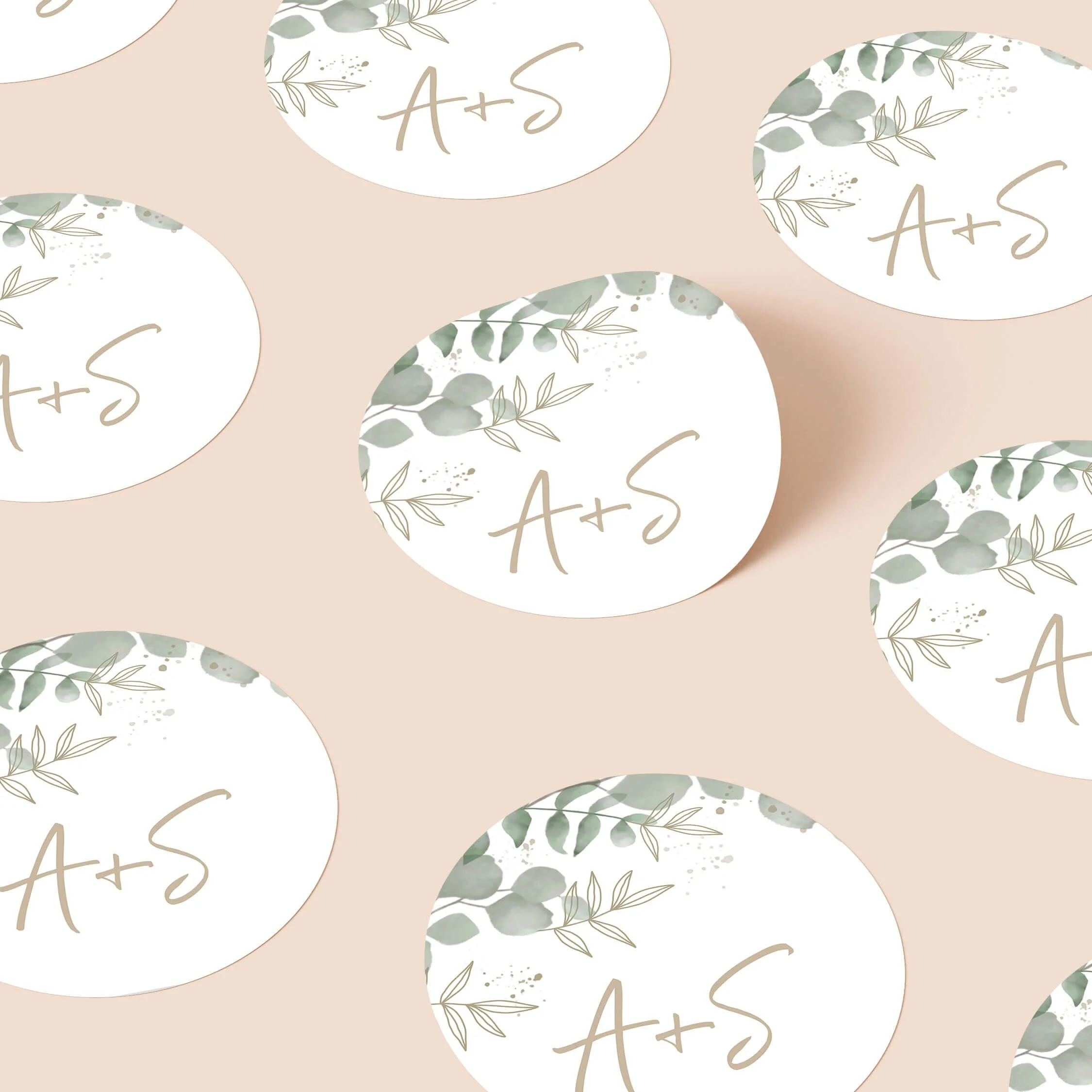 Eucalyptus wedding stickers with soft greenery and handwritten initials repeated on personalised round seals