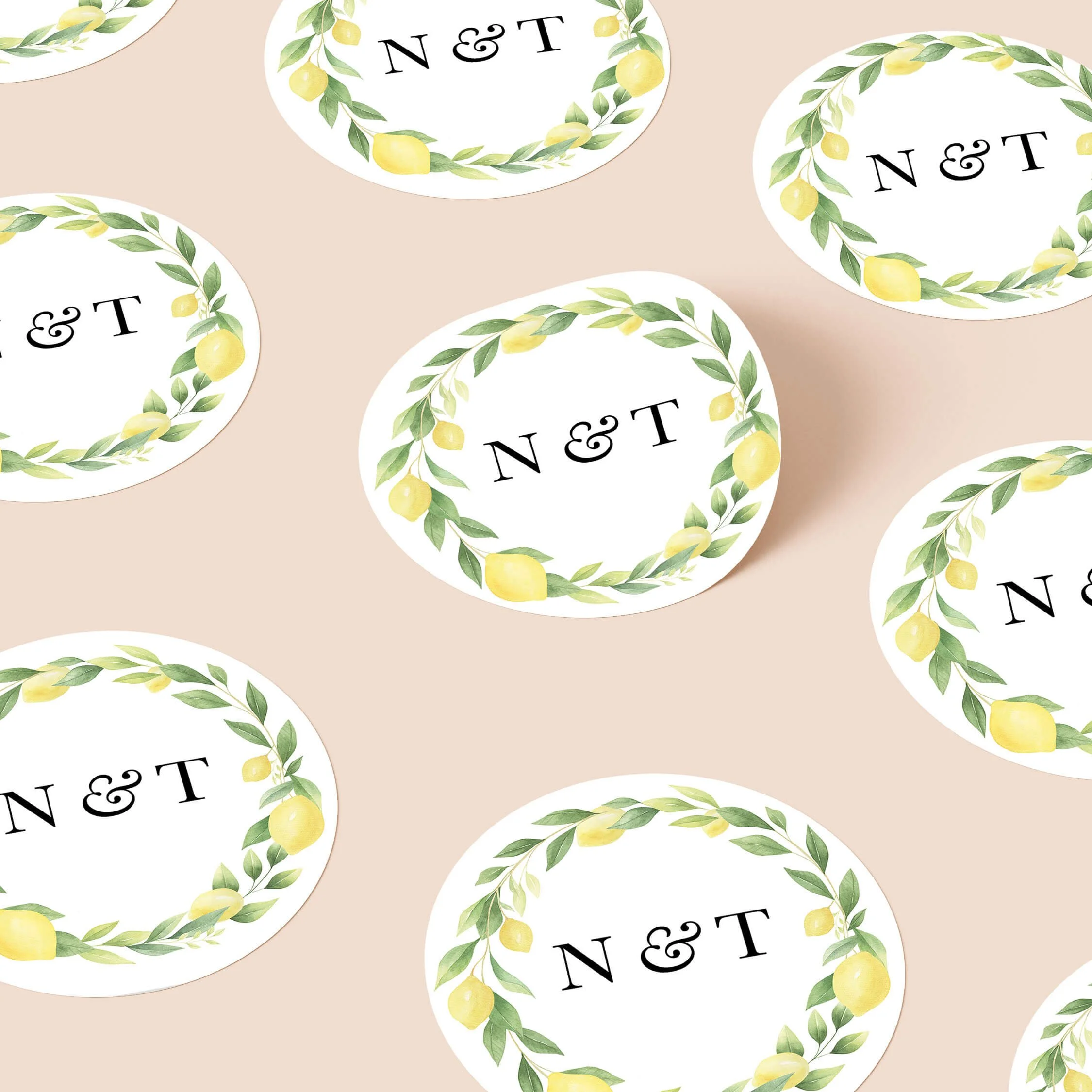 Lemon personalised wedding stickers with citrus lemon wreath and elegant initials on round stickers