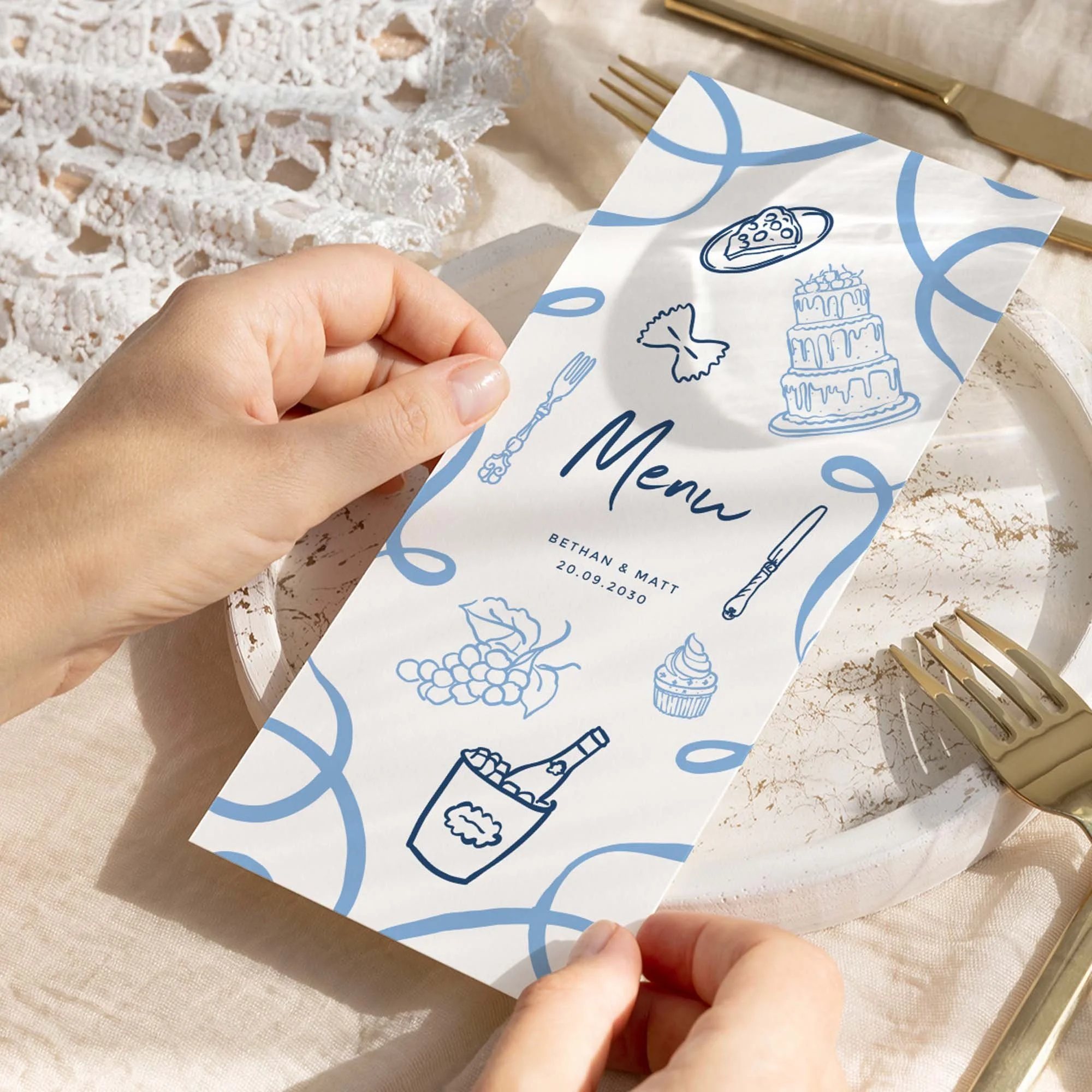 Hand holding Blue Doodle wedding menu card showing size and printed design details