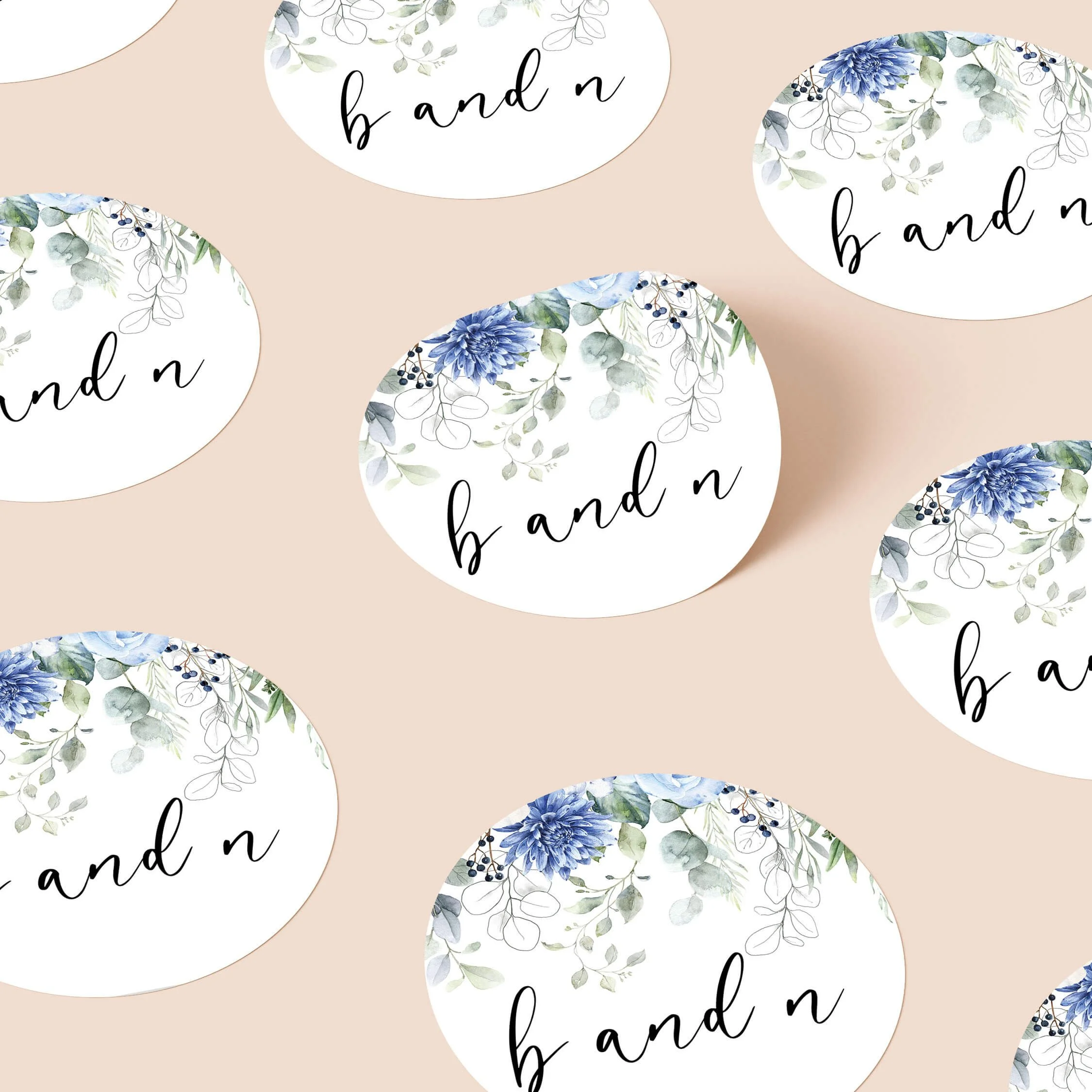Blue floral wedding stickers with soft blue flowers and calligraphy initials repeated on personalised round seals