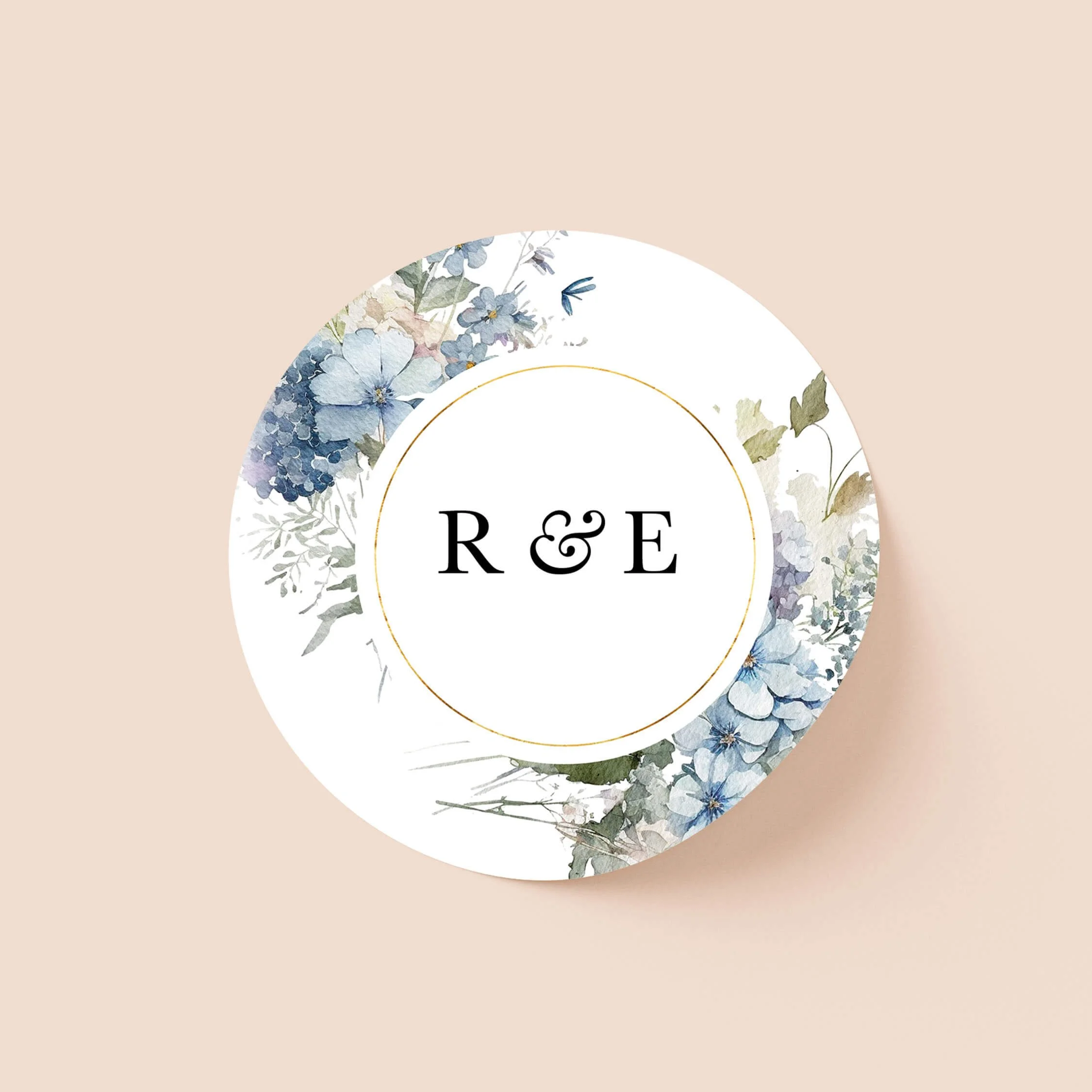 Dusty blue wedding sticker with blue floral design and initials on round personalised seal