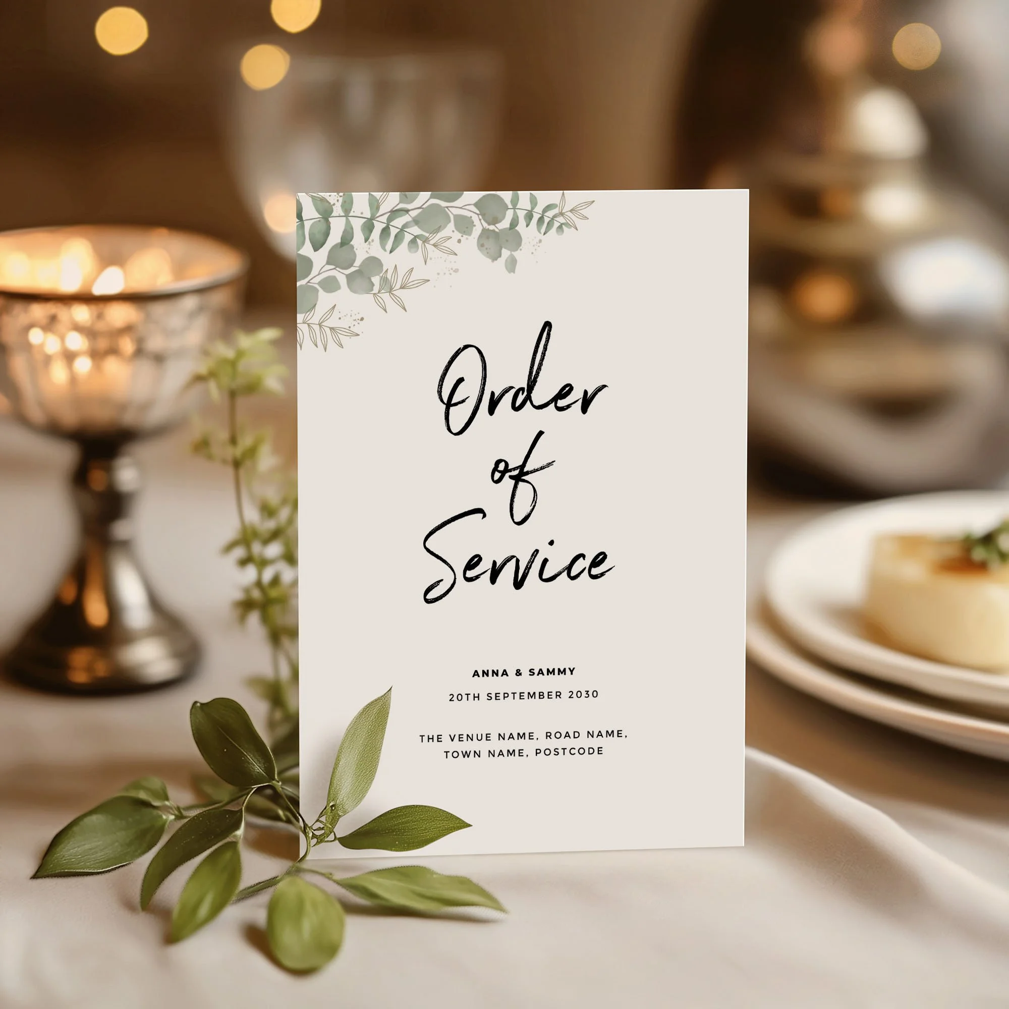 Modern Eucalyptus design wedding order of service standing upright on a wedding day