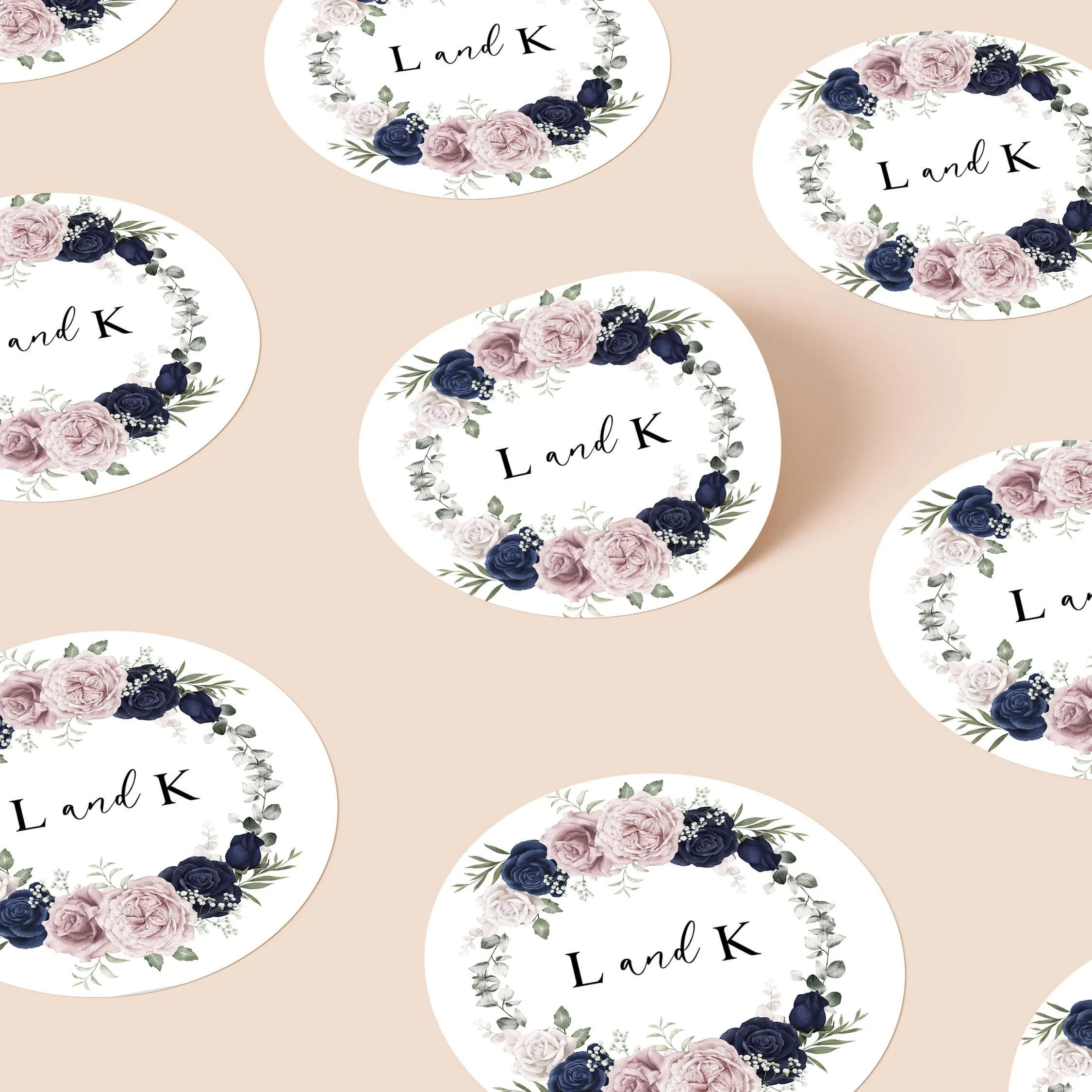 Navy and Blush personalised wedding stickers with blush pink and navy floral wreath design on round stickers