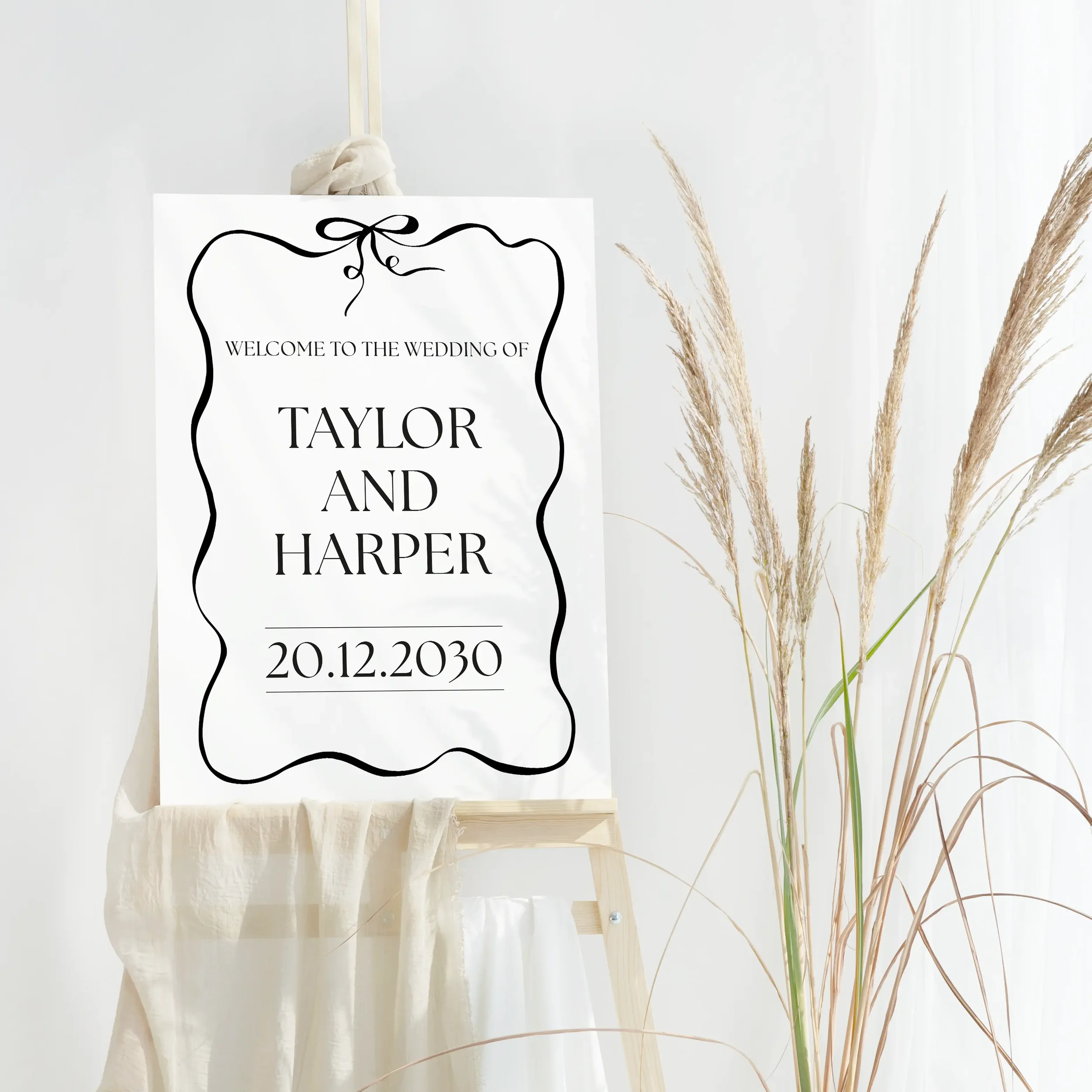 Black Tie Wedding Welcome Sign with bold black border and bow design.