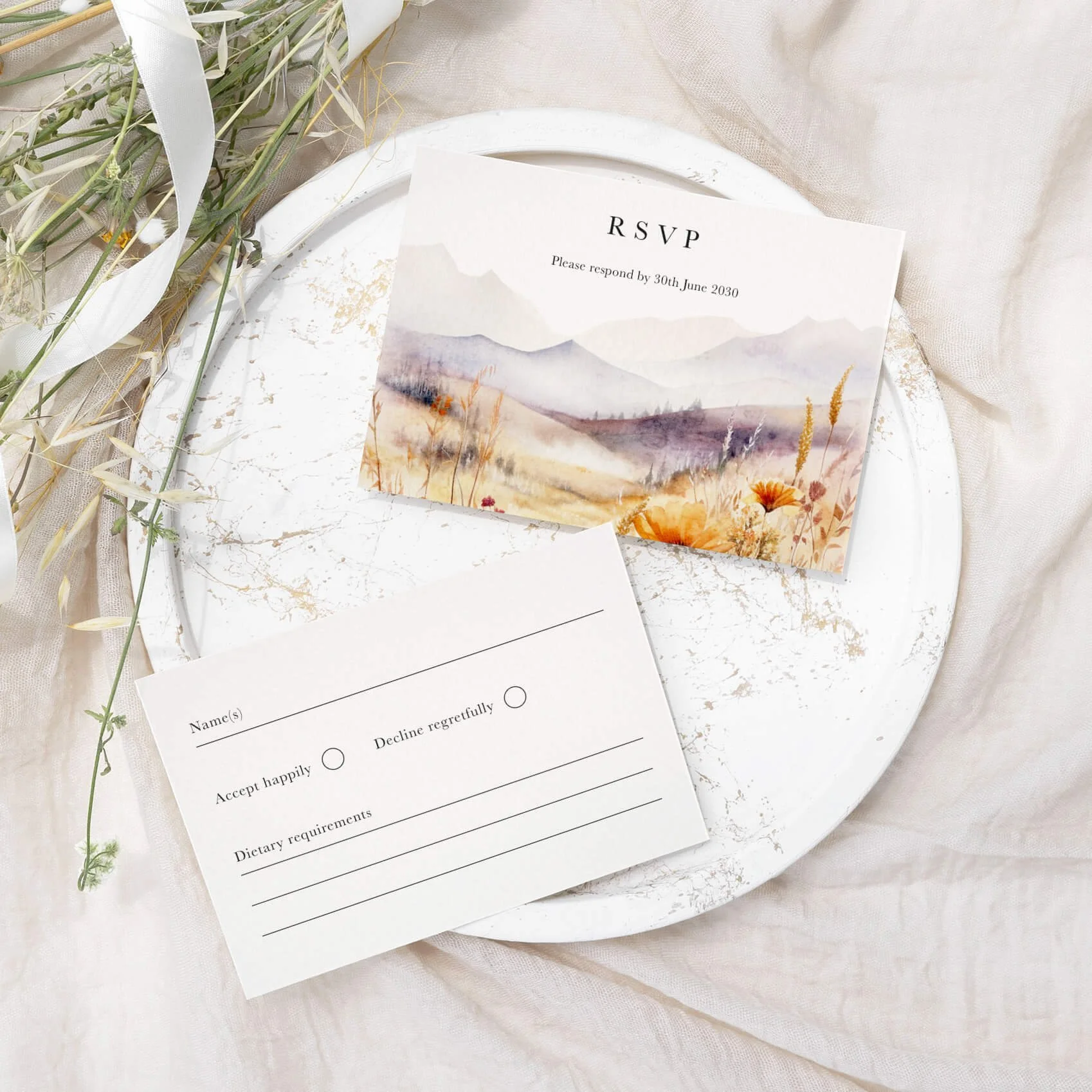 Scenic wedding RSVP card with watercolour mountain landscape illustration on luxury off-white card