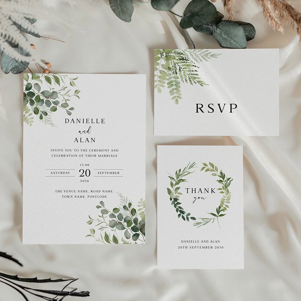 Wedding stationery suite consisting of invitation, RSVP card and thank you card featuring watercolour illustrations of greenery and botanical foliage.