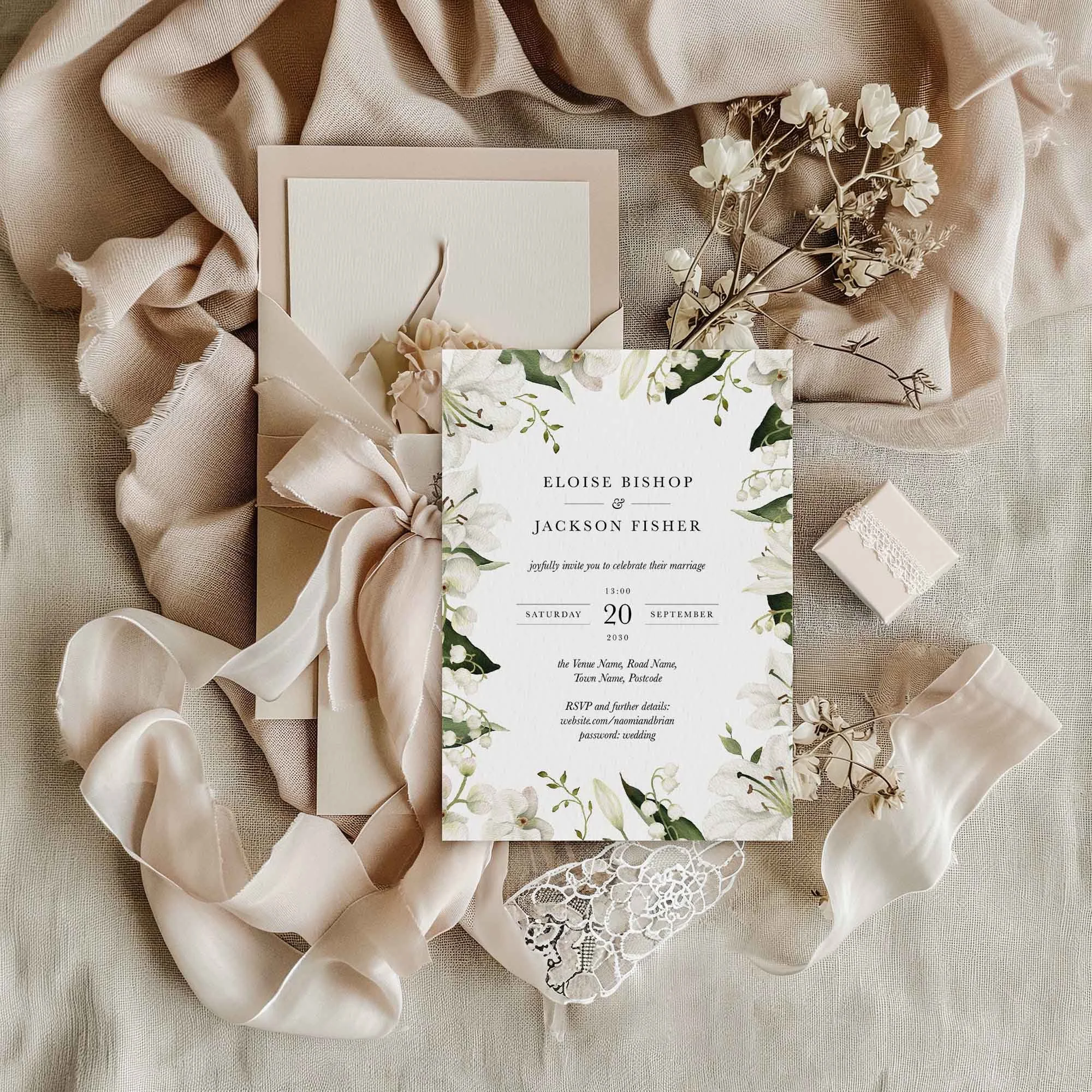 Garden wedding invitation styled in a flat lay environment with wedding props