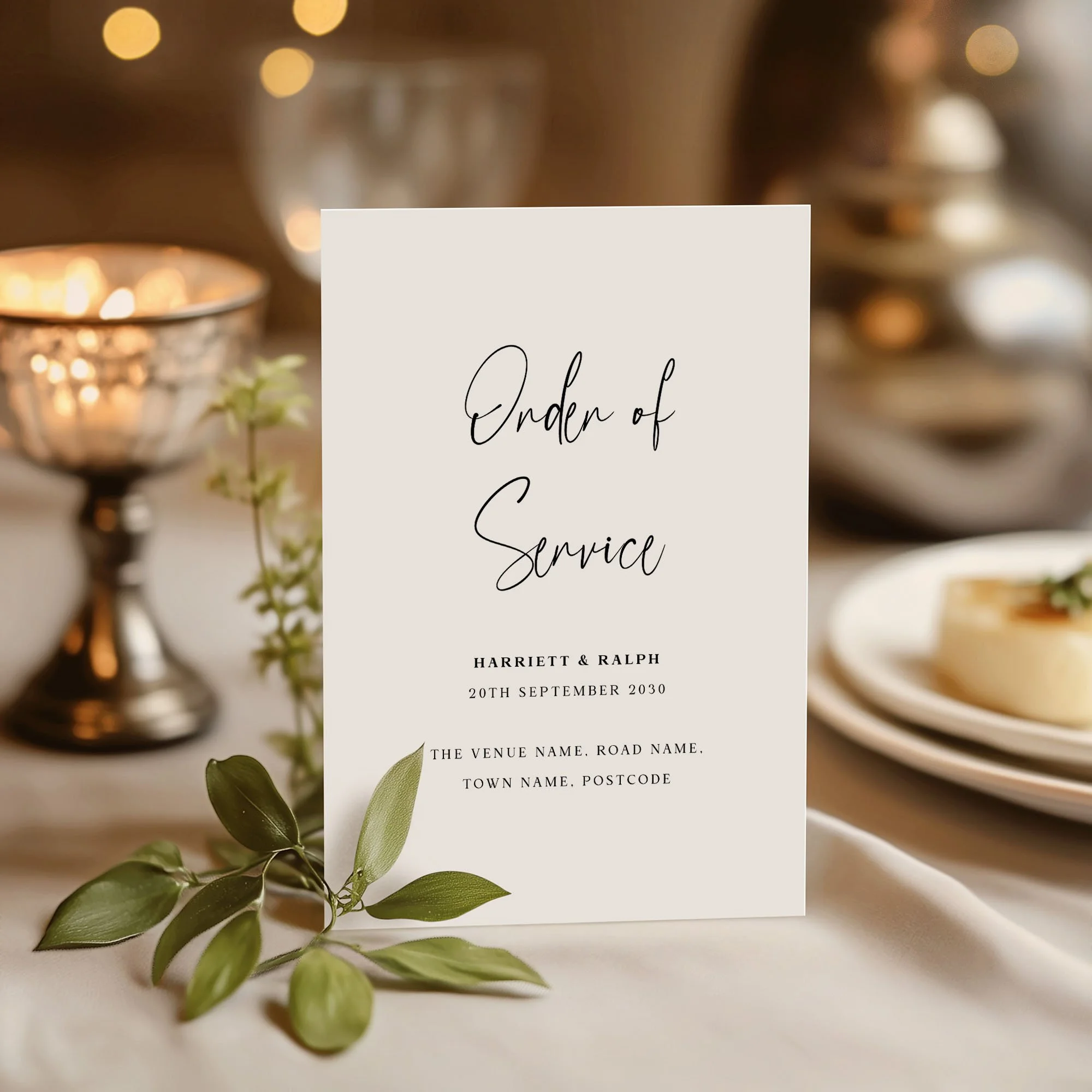 Autograph design wedding order of service standing upright on a wedding day