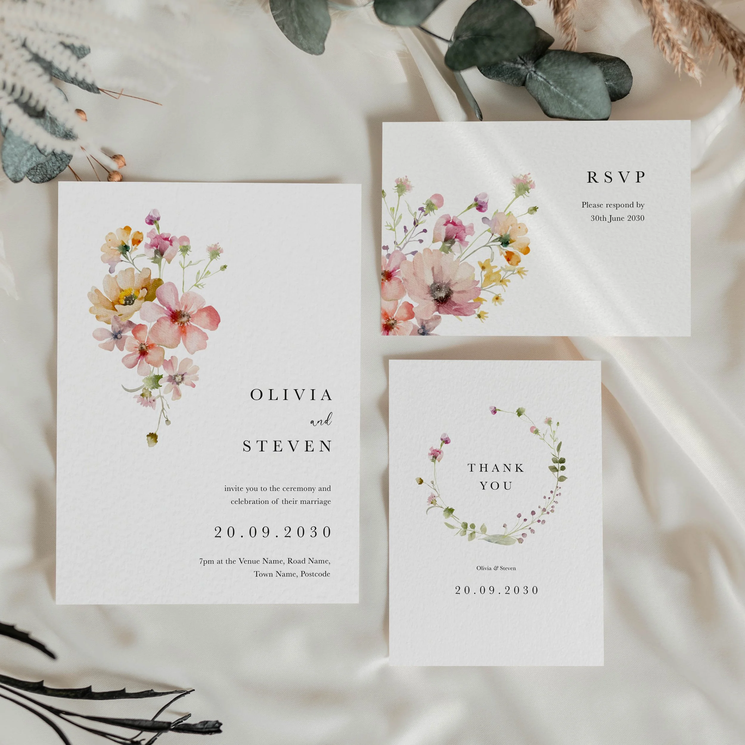 The Bloom wedding stationery collection featuring RSVP card and thank you card with large pastel floral bouquet design in pinks and yellows
