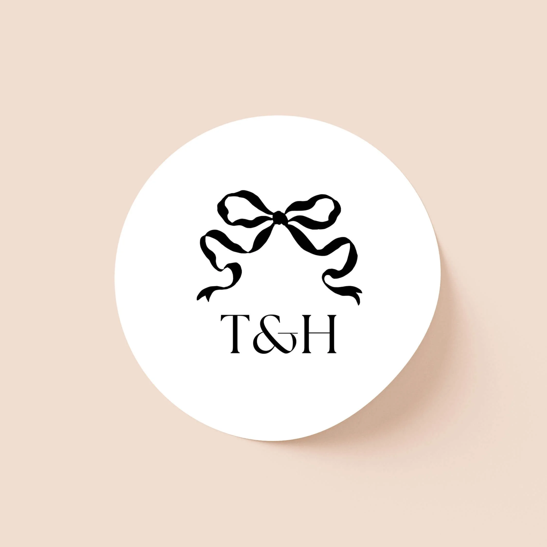 Black tie wedding sticker with bow illustration and serif initials