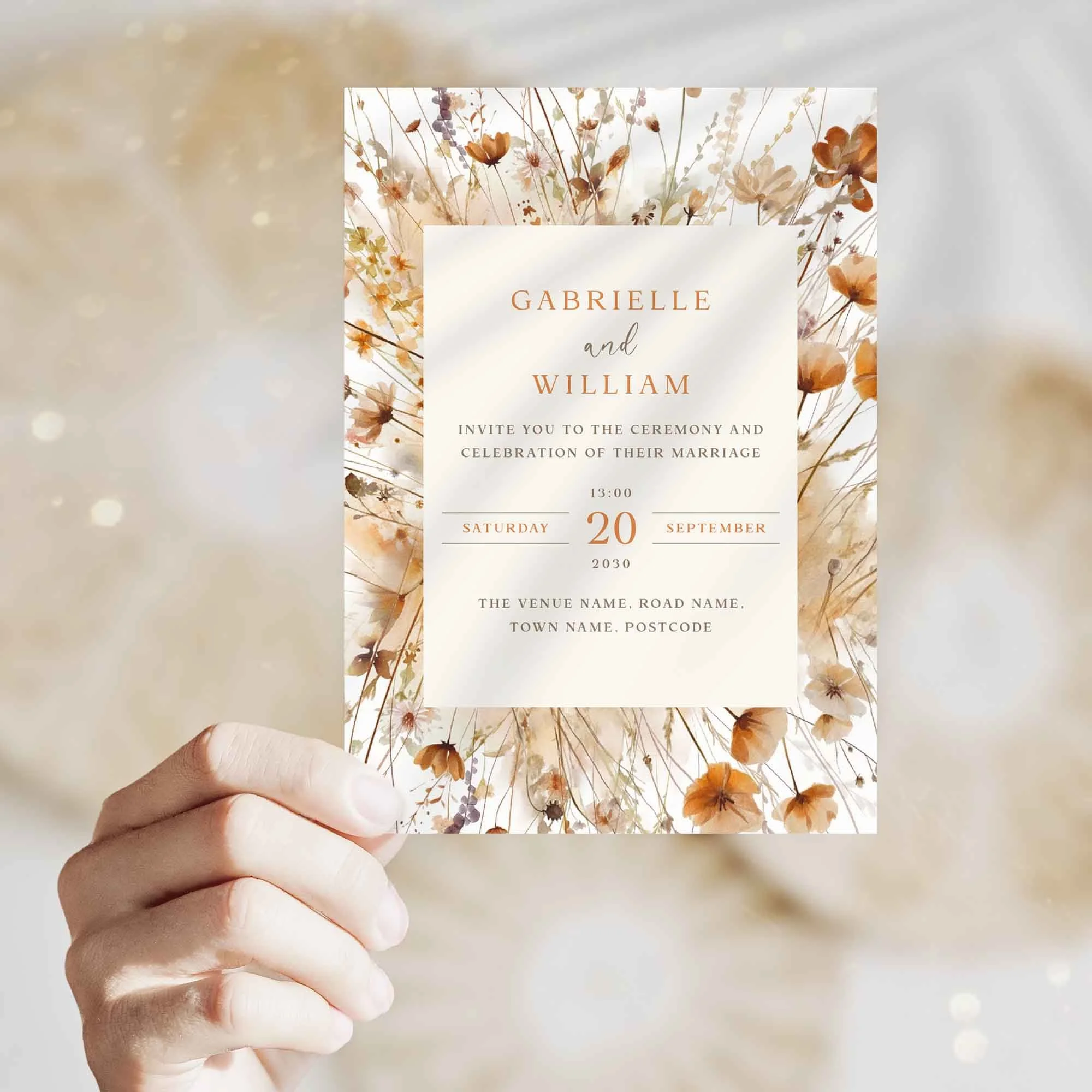 Hand holding Field Harvest Frame wedding invitation showing size and printed design details