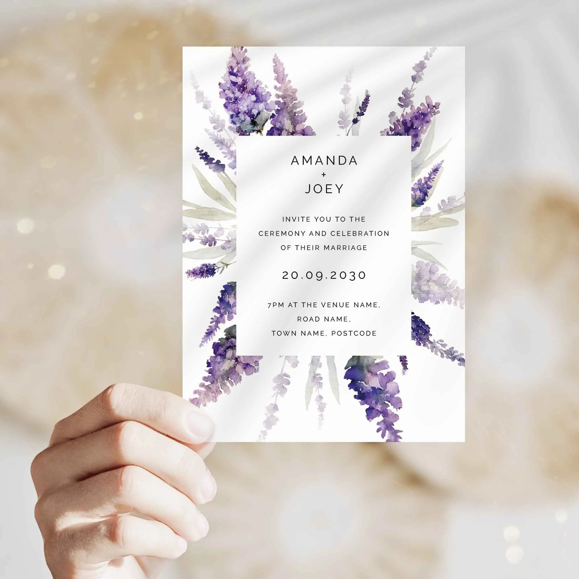 Hand holding Lavender Frame wedding invitation showing size and printed design details