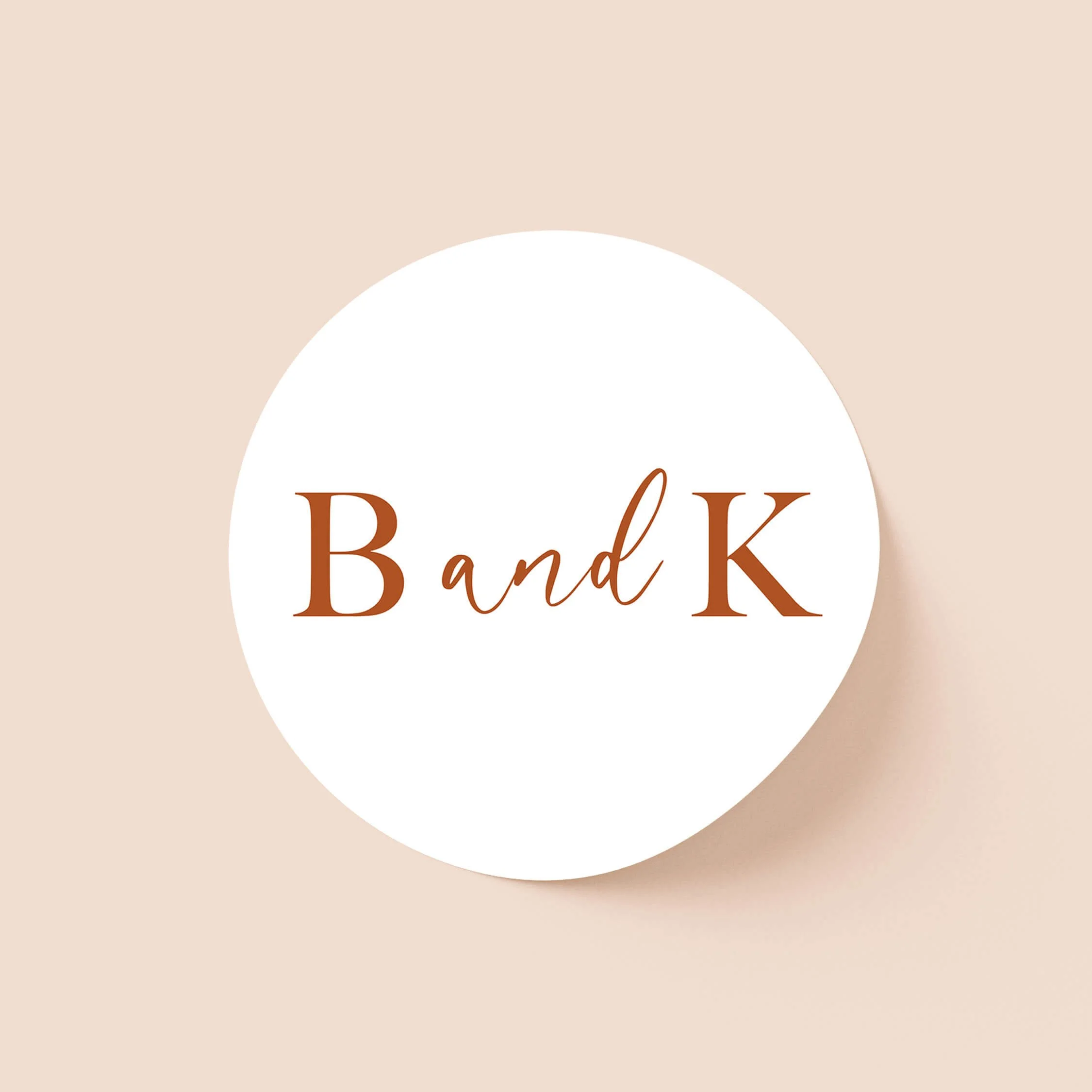 Arch wedding sticker with serif and script initials typography on round sticker