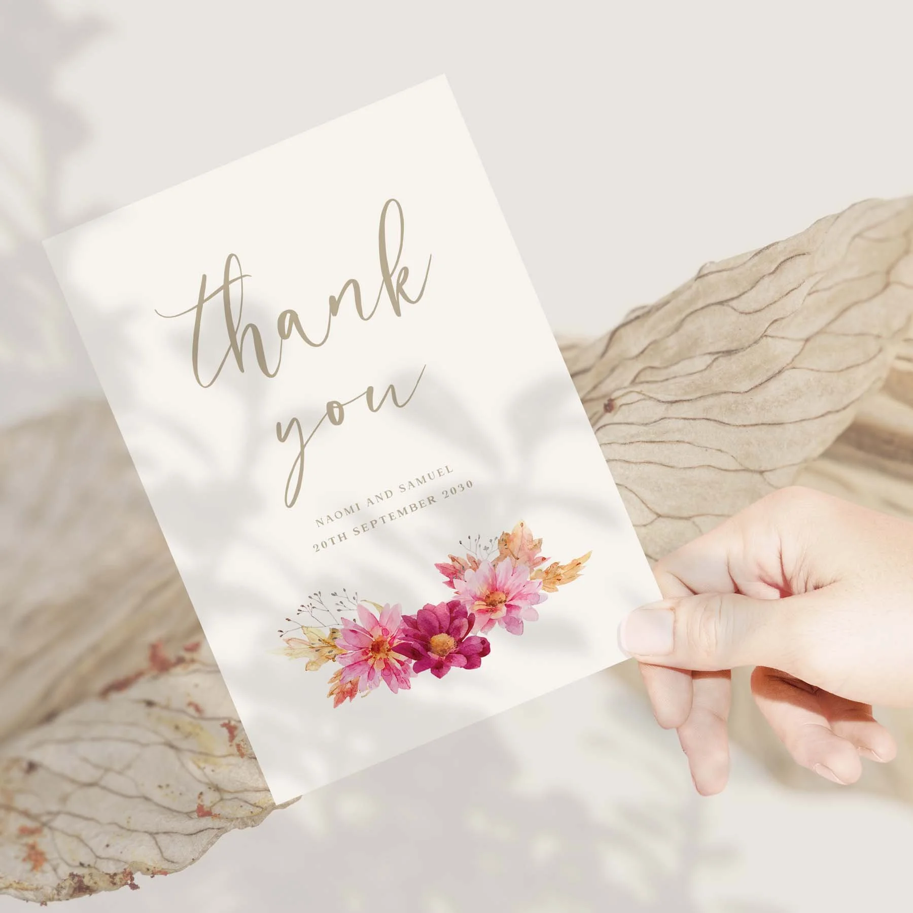 Hand holding a Chrysanthemum wedding thank you card