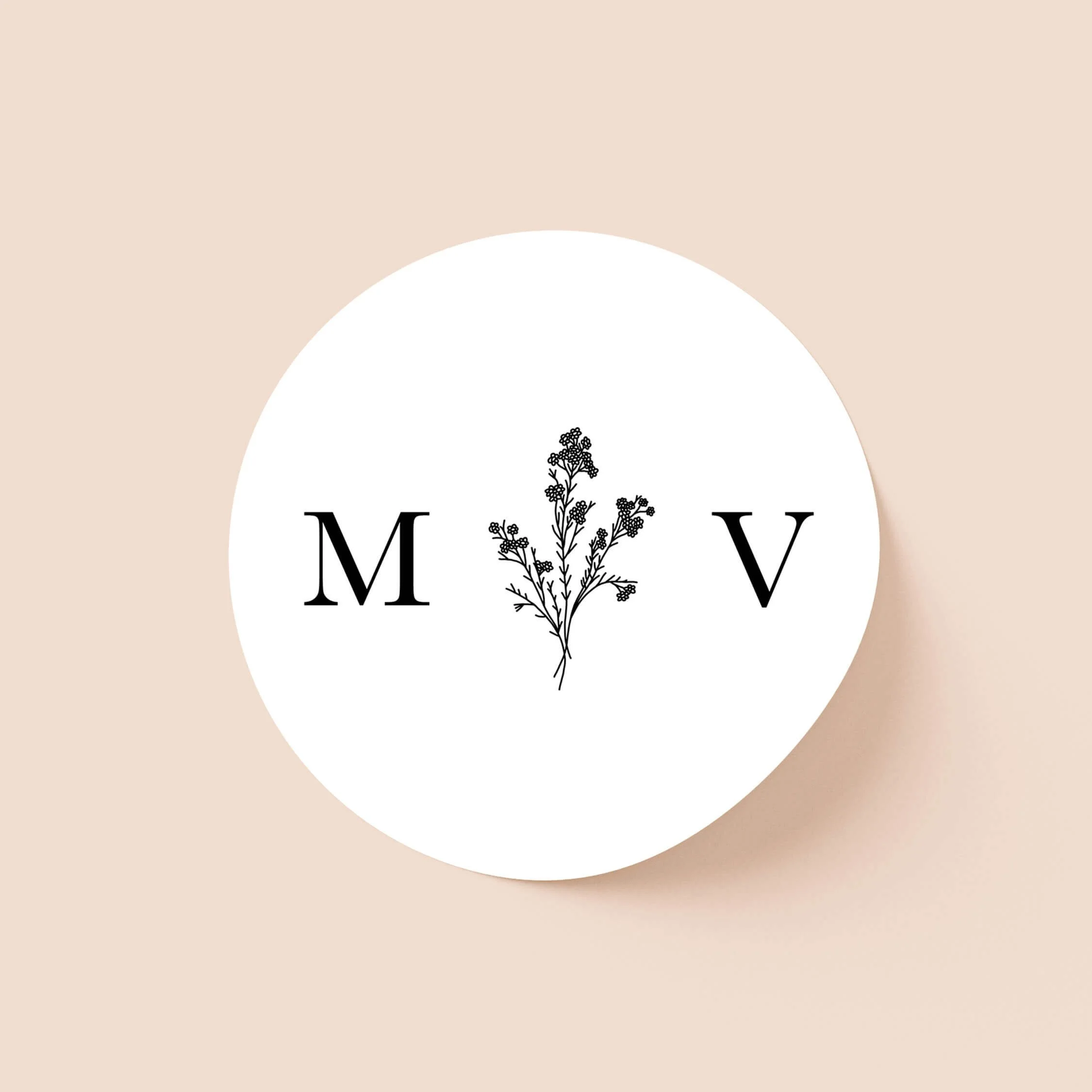 Monogram personalised wedding sticker with serif initials and botanical illustration on round sticker