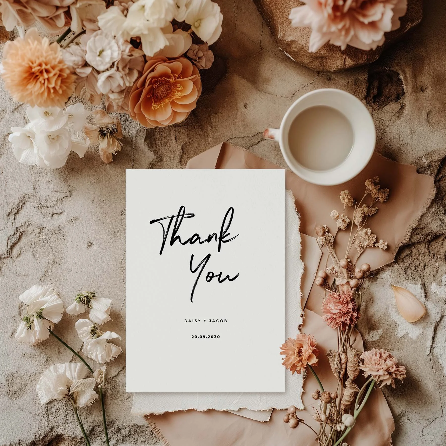 Modern Simple wedding thank you card styled with flowers and stationery details