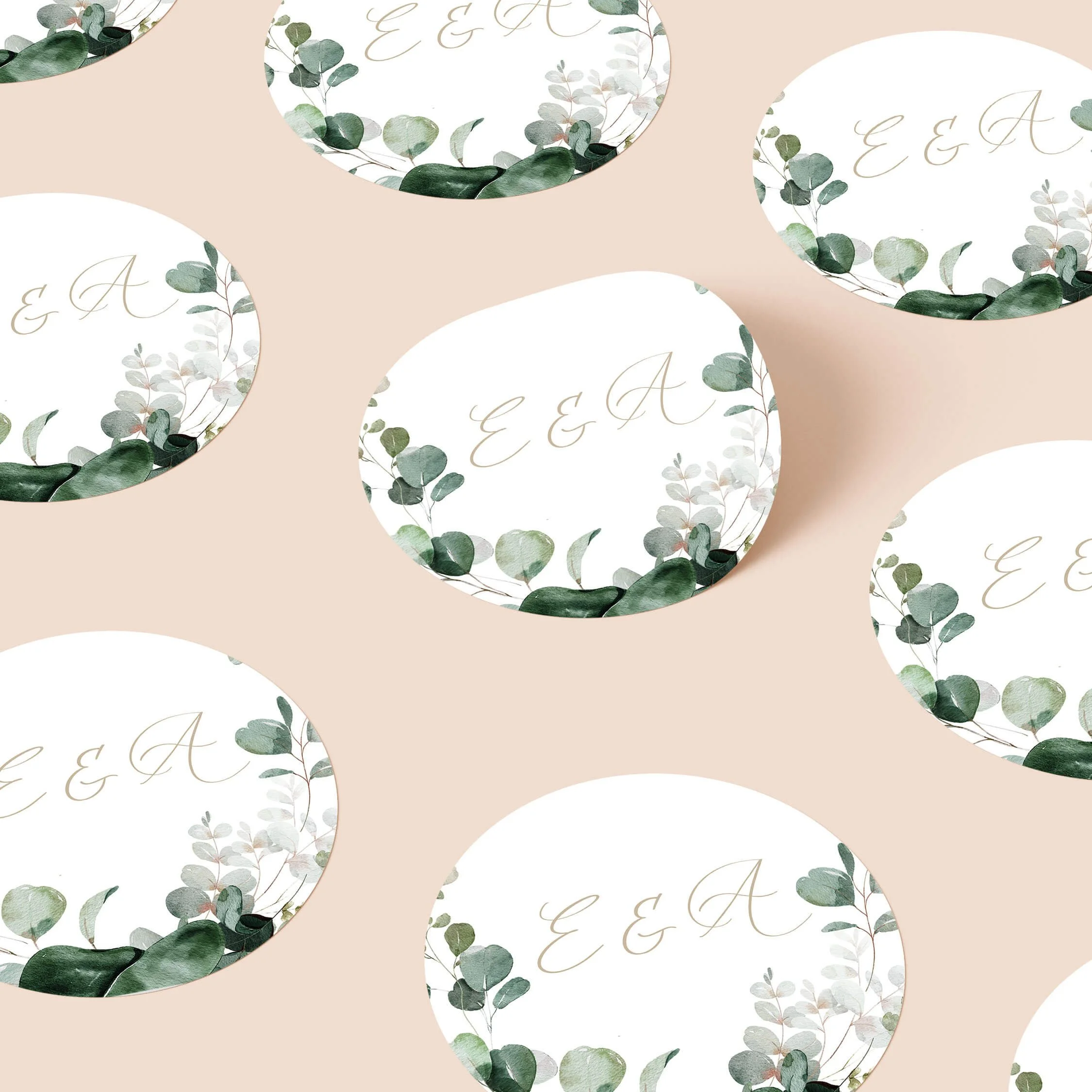 Emerald Forest wedding stickers with eucalyptus greenery and script initials repeated on personalised round seals