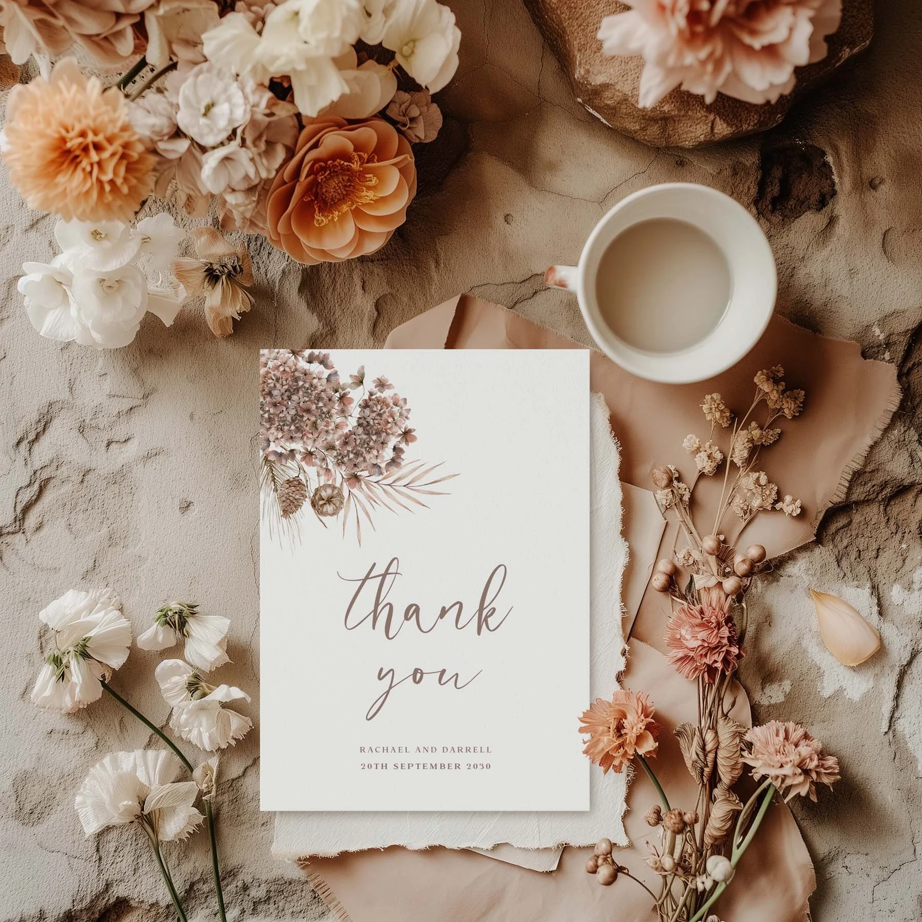 Earth Toned Boho wedding thank you card styled with flowers and stationery details