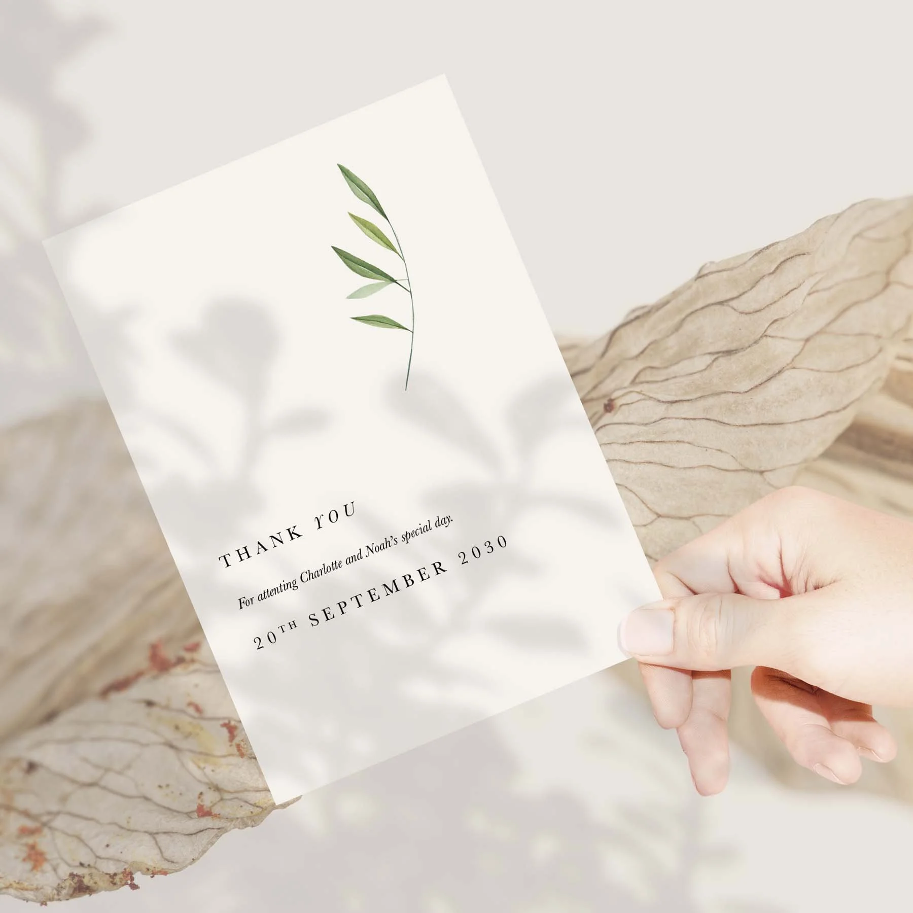 Hand holding a Minimal Olive wedding thank you card