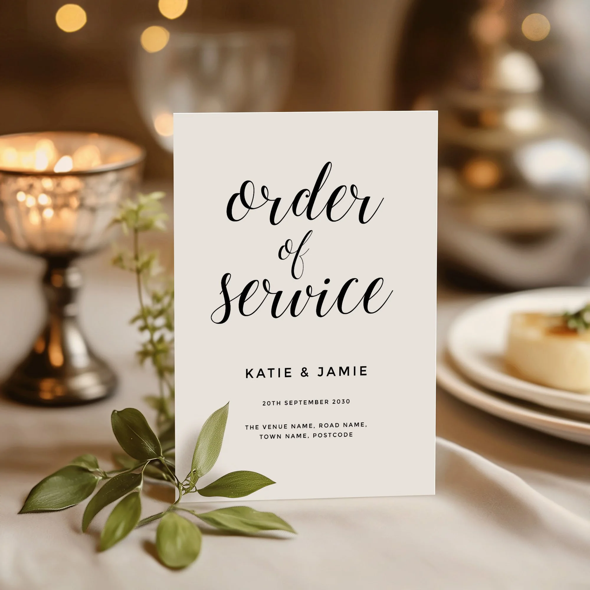 Calligraphy design wedding order of service standing upright on a wedding day