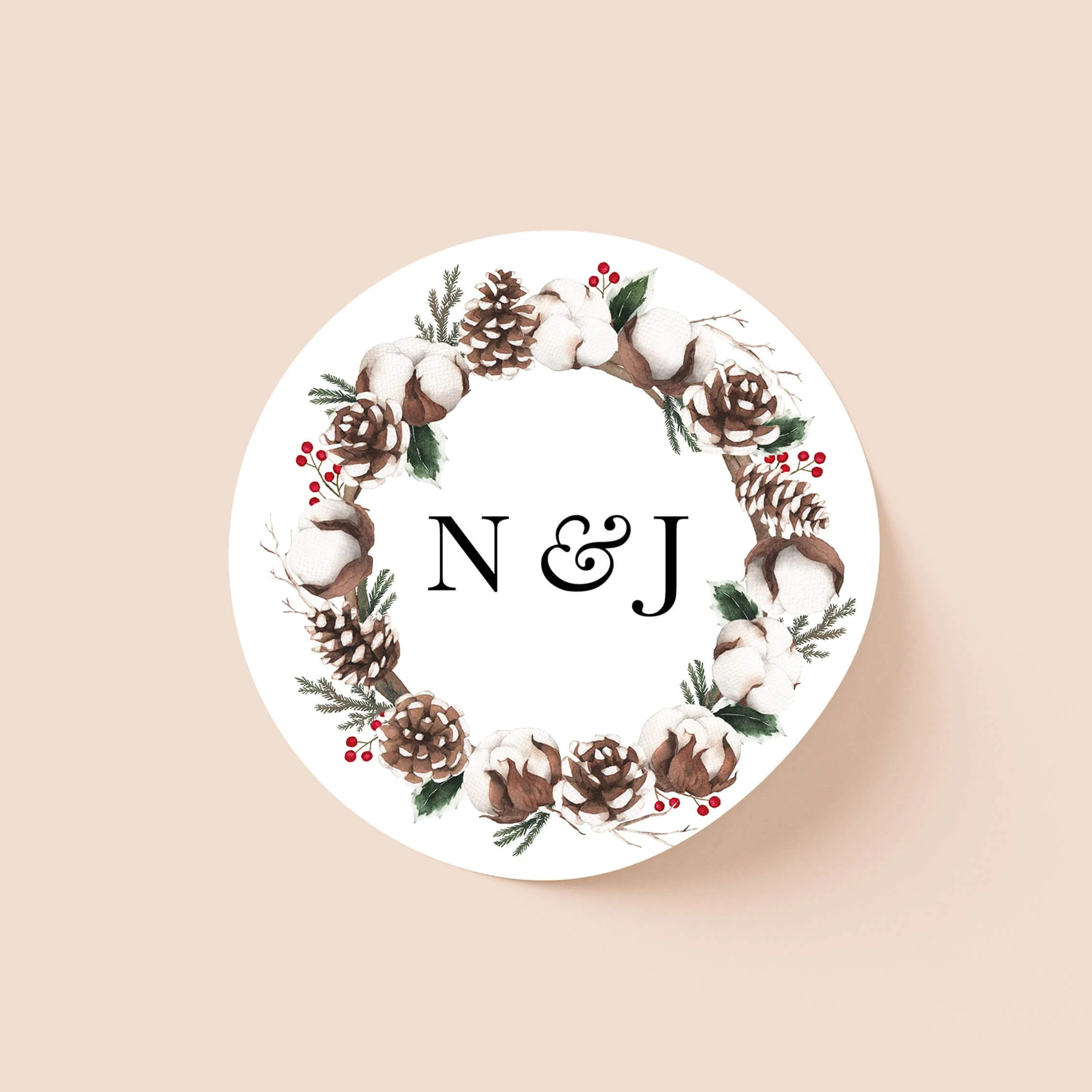 Woodland personalised wedding sticker with rustic pine cone cotton and red berry circular wreath and serif initials on round sticker