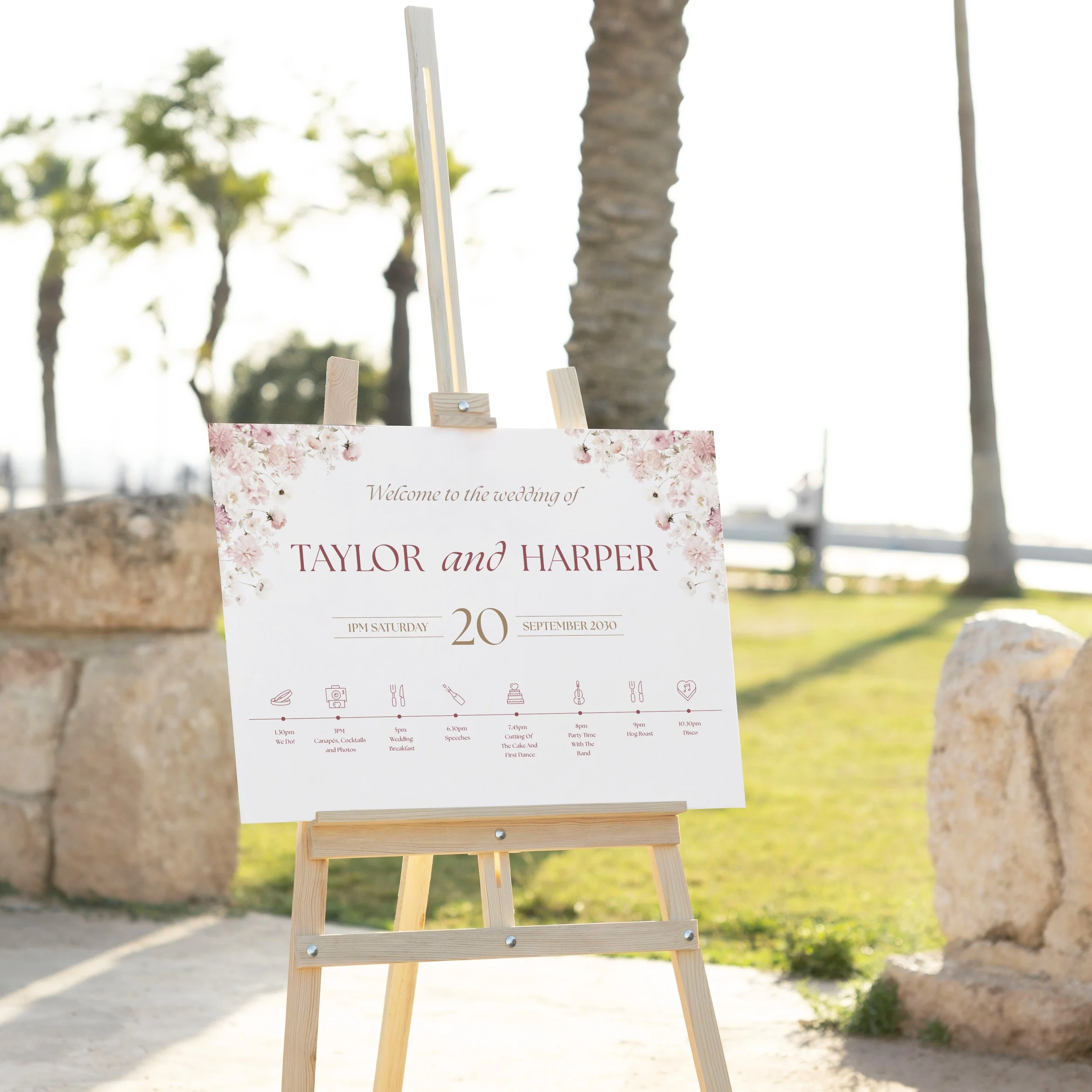 Petal Wedding Welcome Sign on easel at a wedding venue with modern floral details.