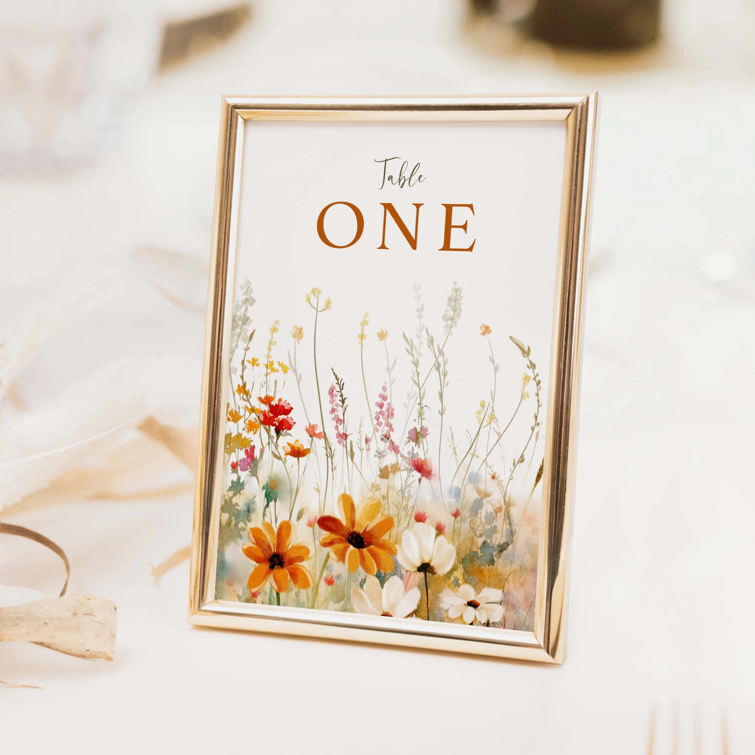 Field Vermillion wedding table number with vibrant vermillion orange and red wildflower meadow illustration on luxury off-white card