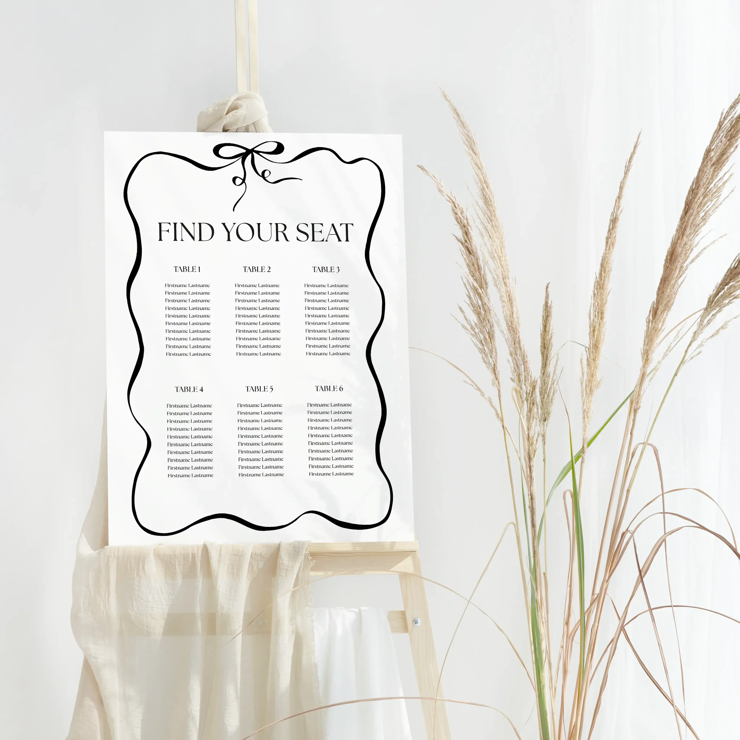 Black Tie Wedding Table Plan Board with black bow, bold border, and elegant monochrome design.
