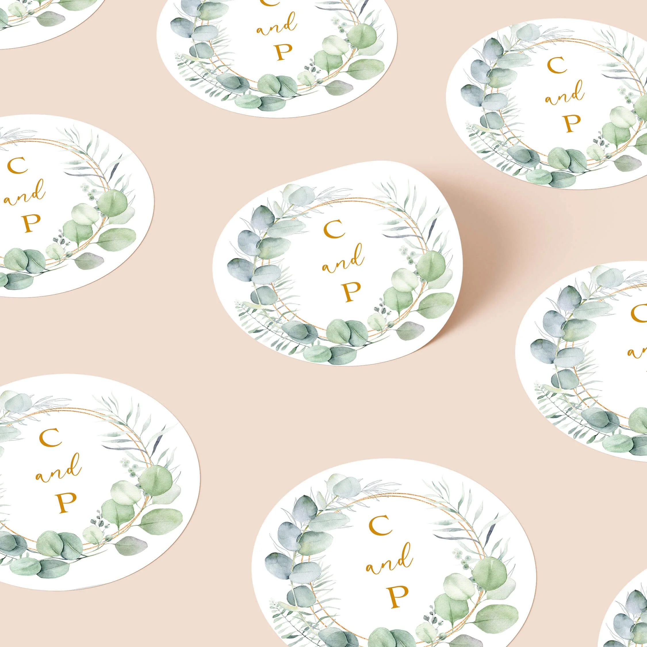 Eucalyptus Frame wedding stickers with botanical greenery border and initials repeated on personalised round seals