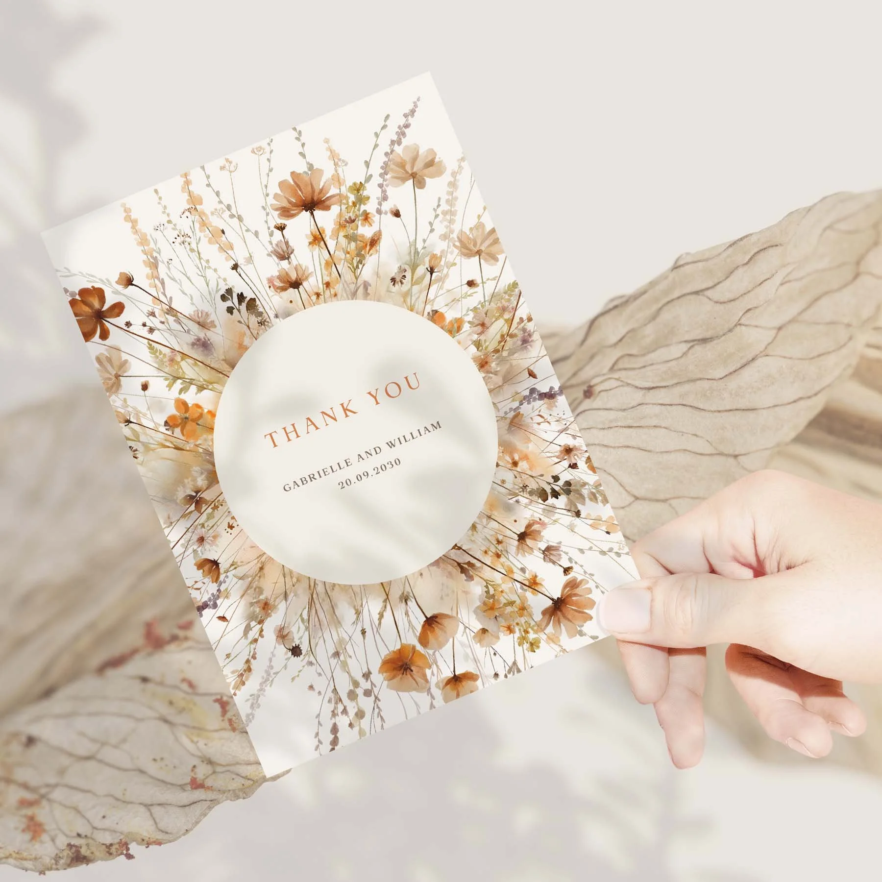 Hand holding a Brown Floral Frame wedding thank you card