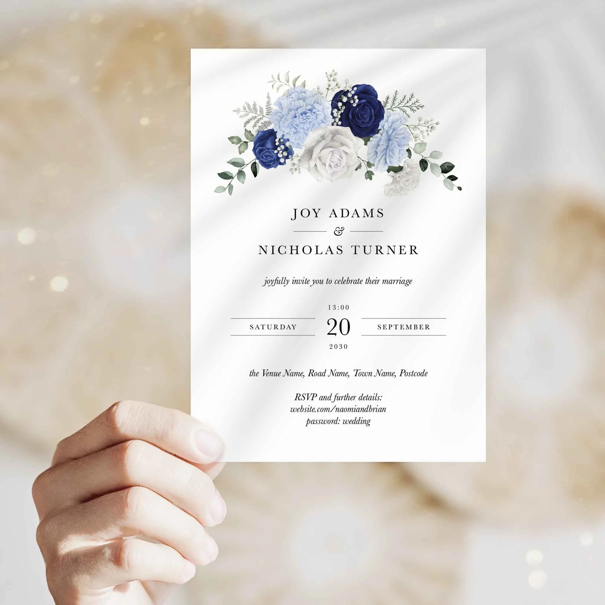 Hand holding Blue and White Rose wedding invitation showing size and printed design details
