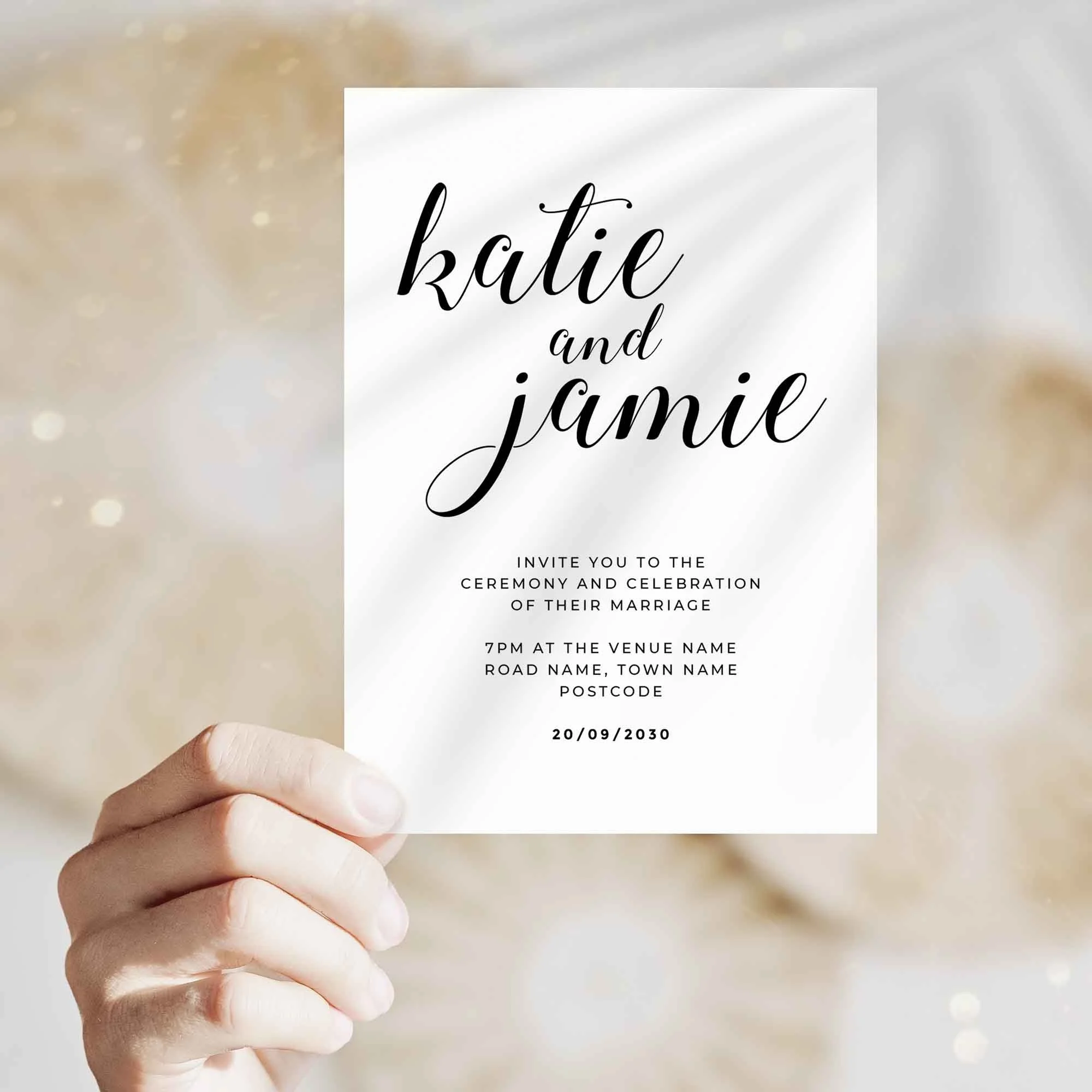 Hand holding Calligraphy wedding invitation showing size and printed design details