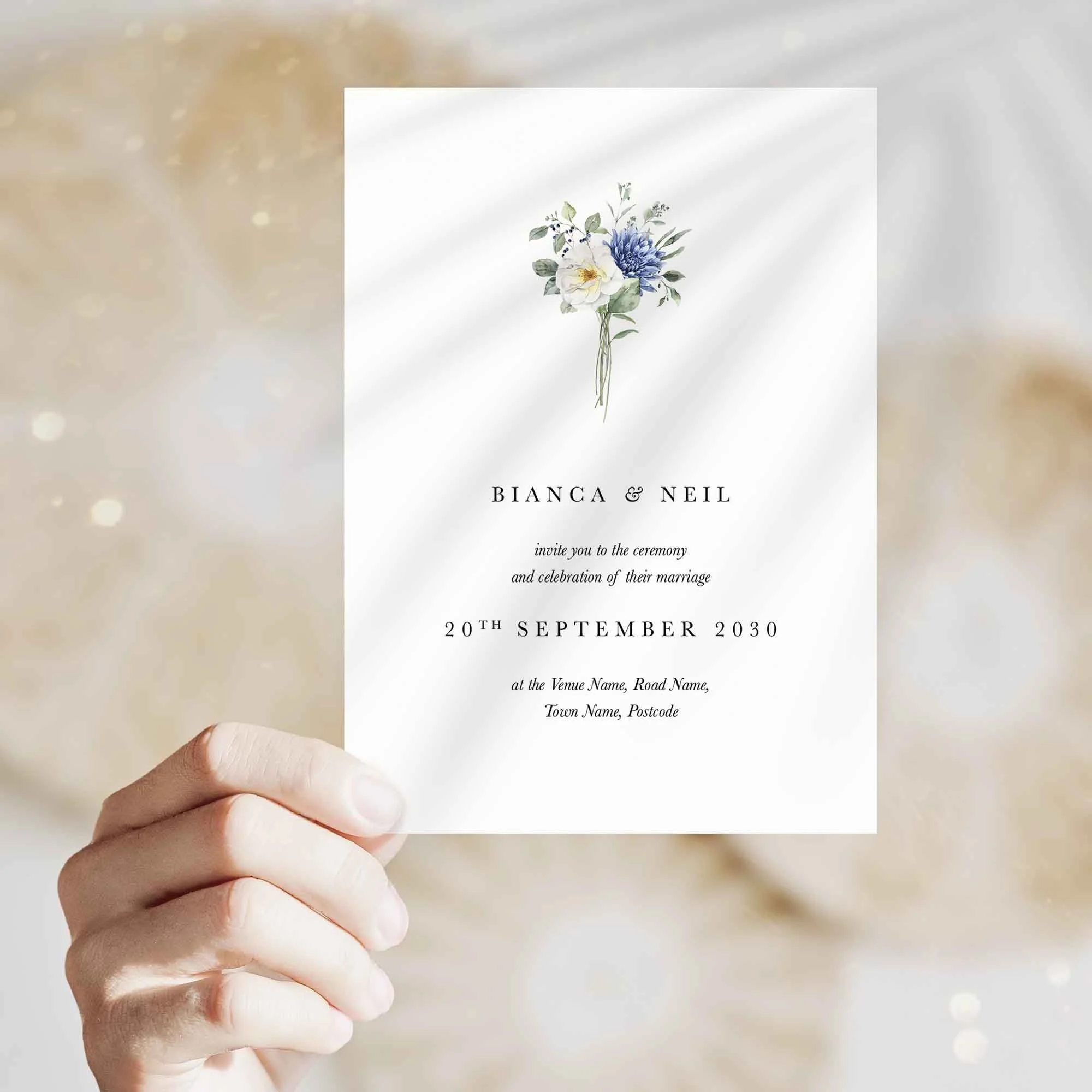 Hand holding Blue Floral Bouquet wedding invitation showing size and printed design details