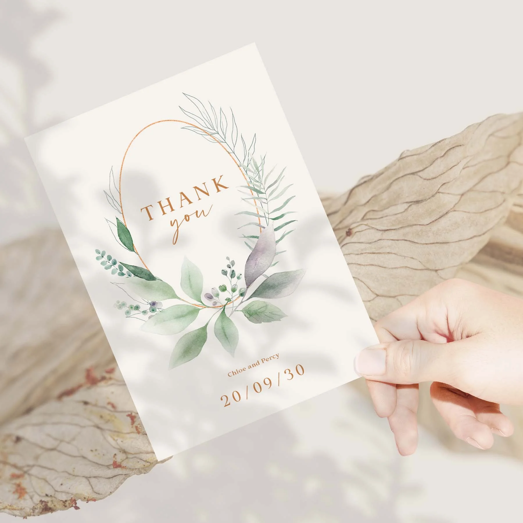 Hand holding a Eucalyptus Frame wedding thank you card