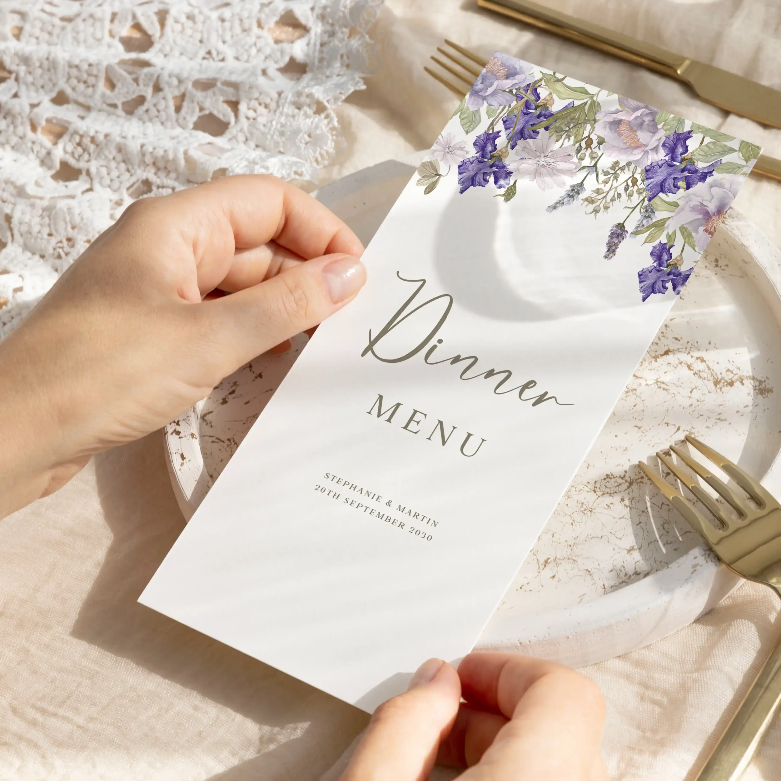 Hand holding Purple Floral wedding menu card showing size and printed design details