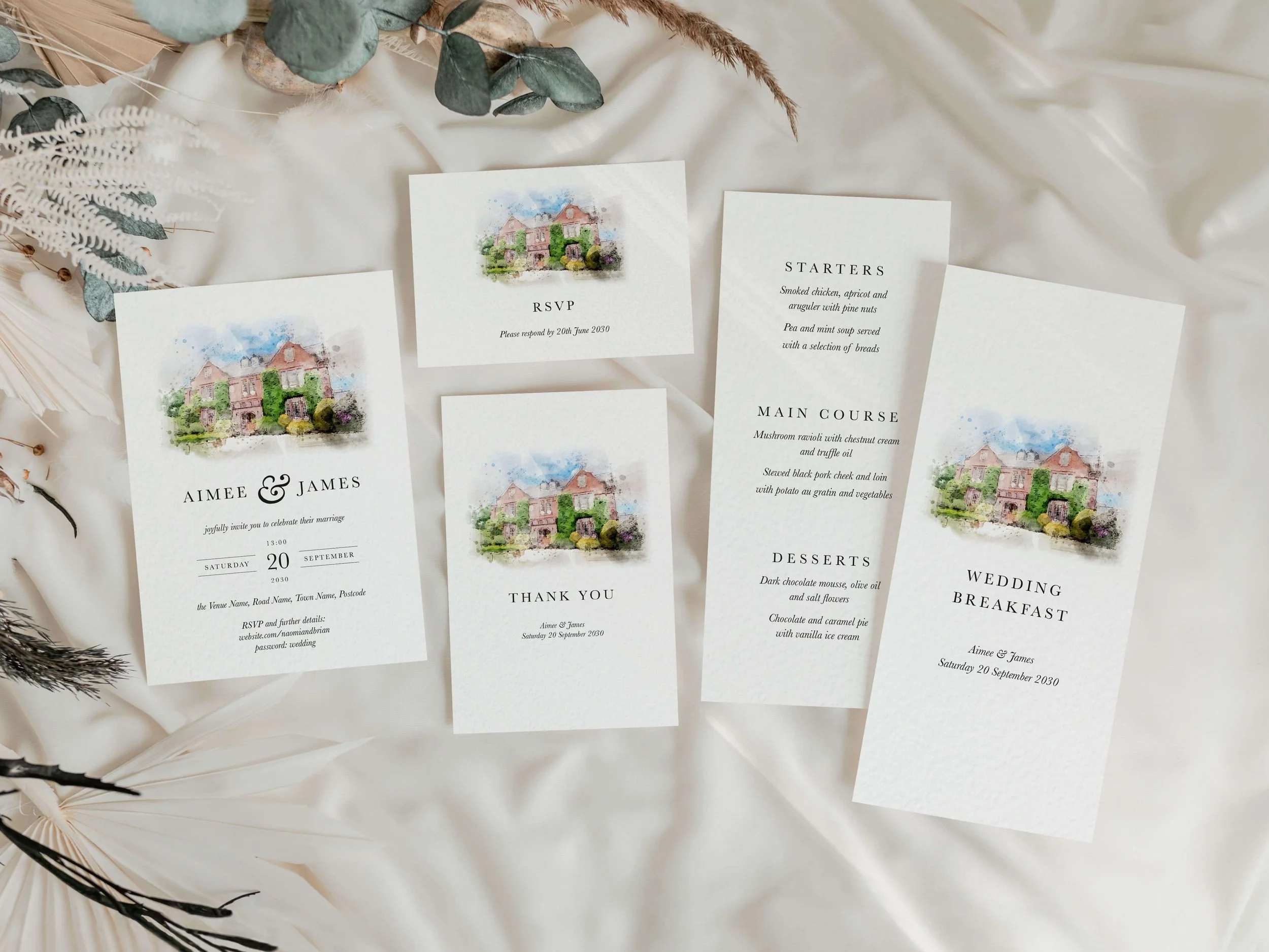 Coordinated watercolour wedding venue stationery suite including invitations, RSVP cards, menus and thank you cards.