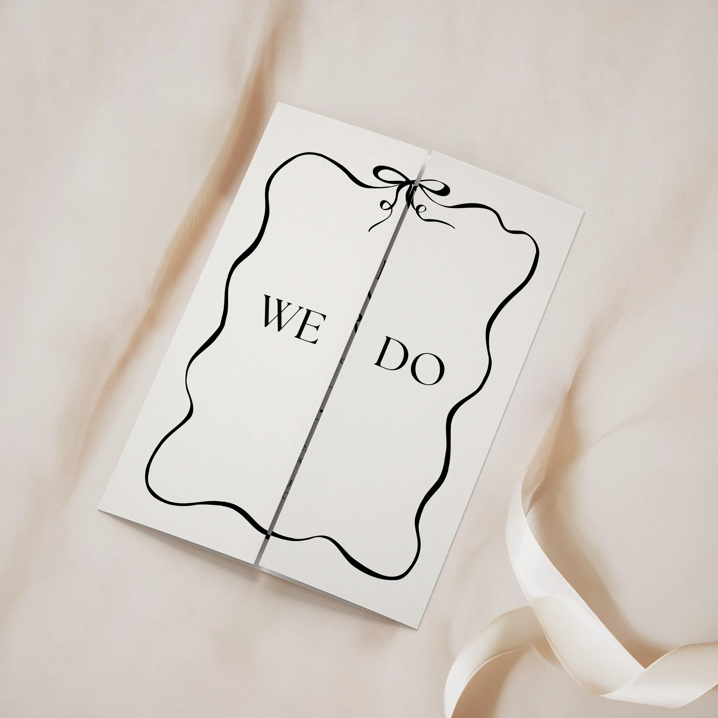 Black Tie Gatefold Wedding Invitation folded, featuring elegant black bow and monochrome design.