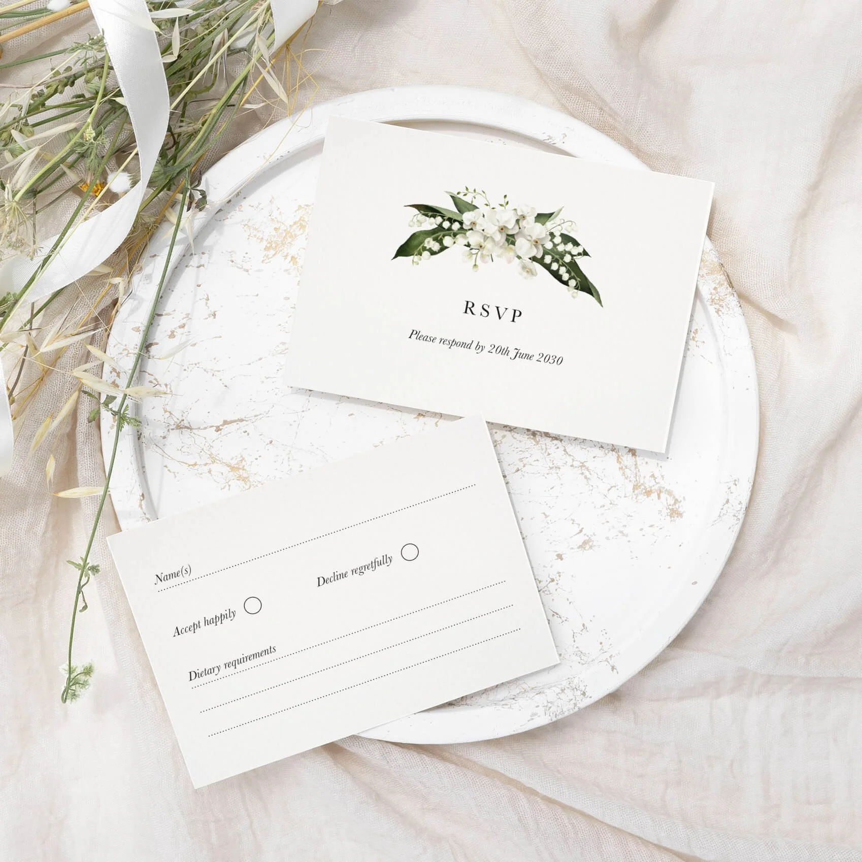 Garden wedding RSVP card with white floral watercolour botanical illustration on luxury off-white card