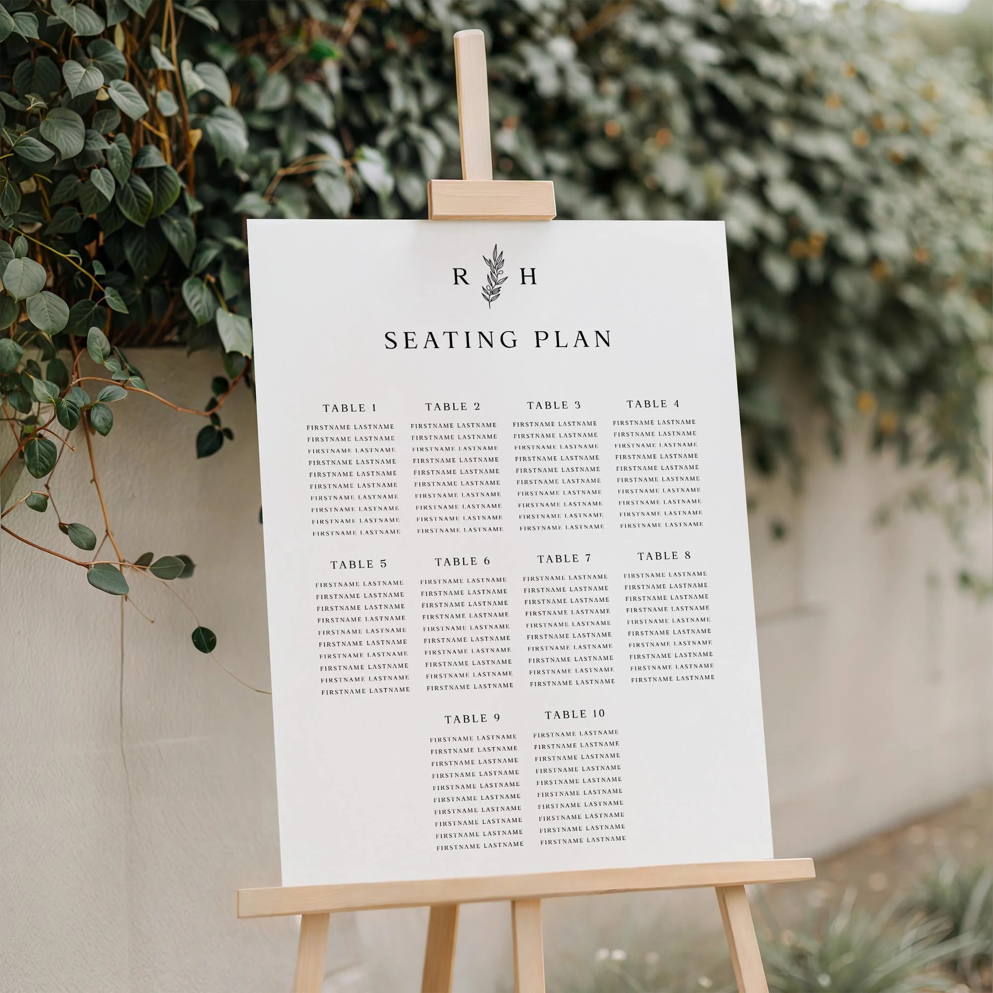 Close-up of the Heritage wedding seating plan board displayed outdoors